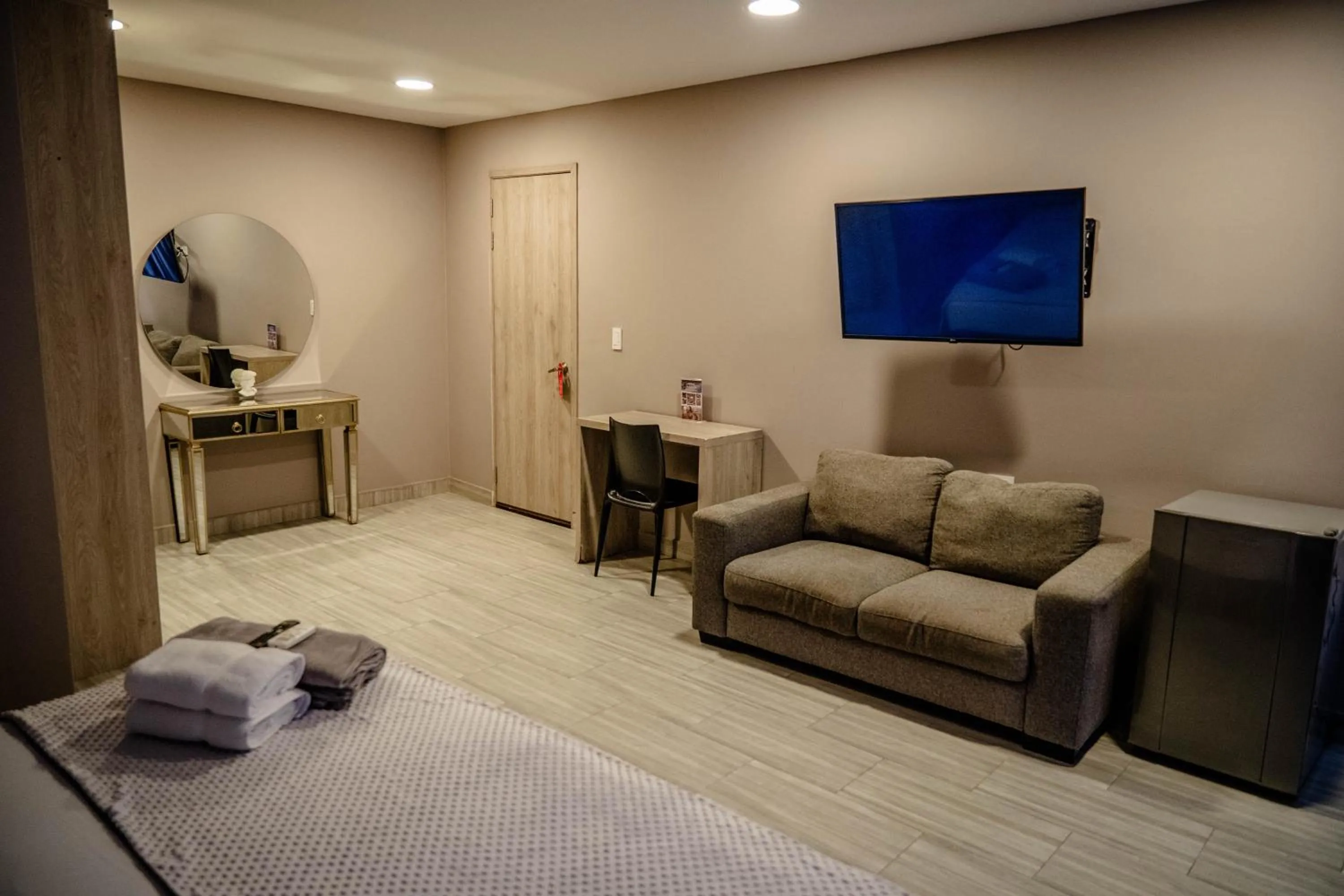 Bed in Bahia 79 Apartasuites Cerca al Centro