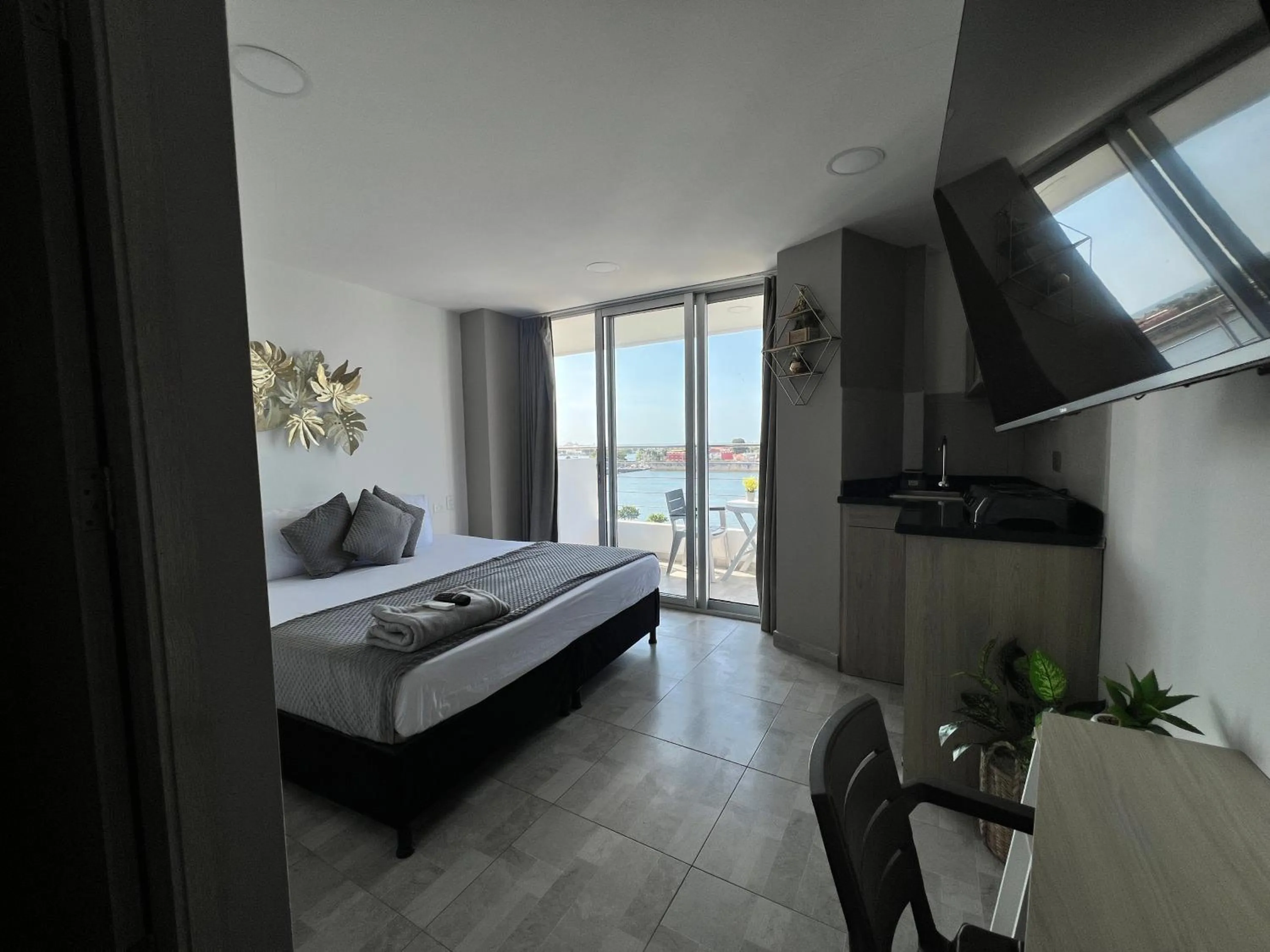 Bed in Bahia 79 Apartasuites Cerca al Centro