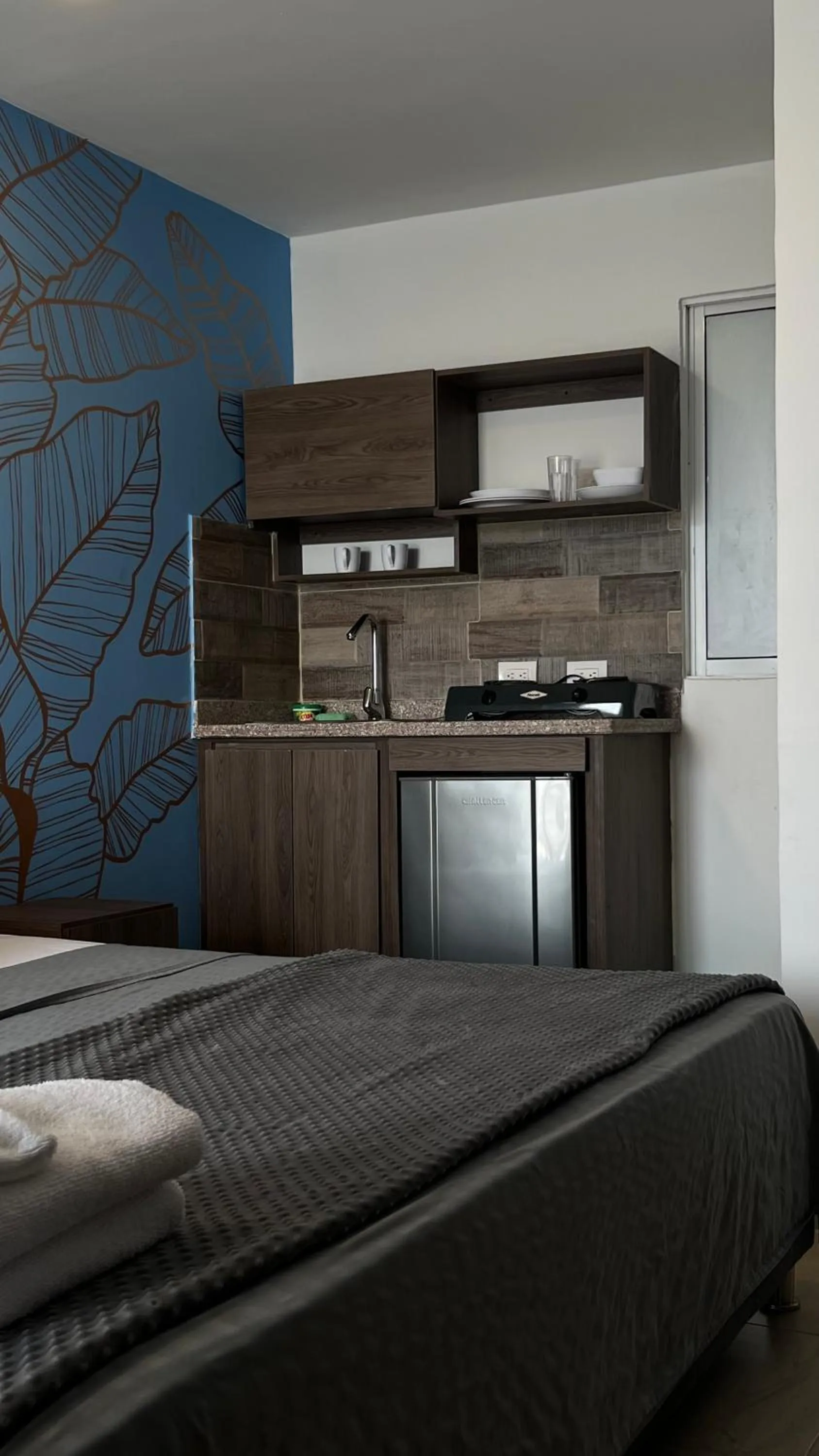 Bed in Bahia 79 Apartasuites Cerca al Centro