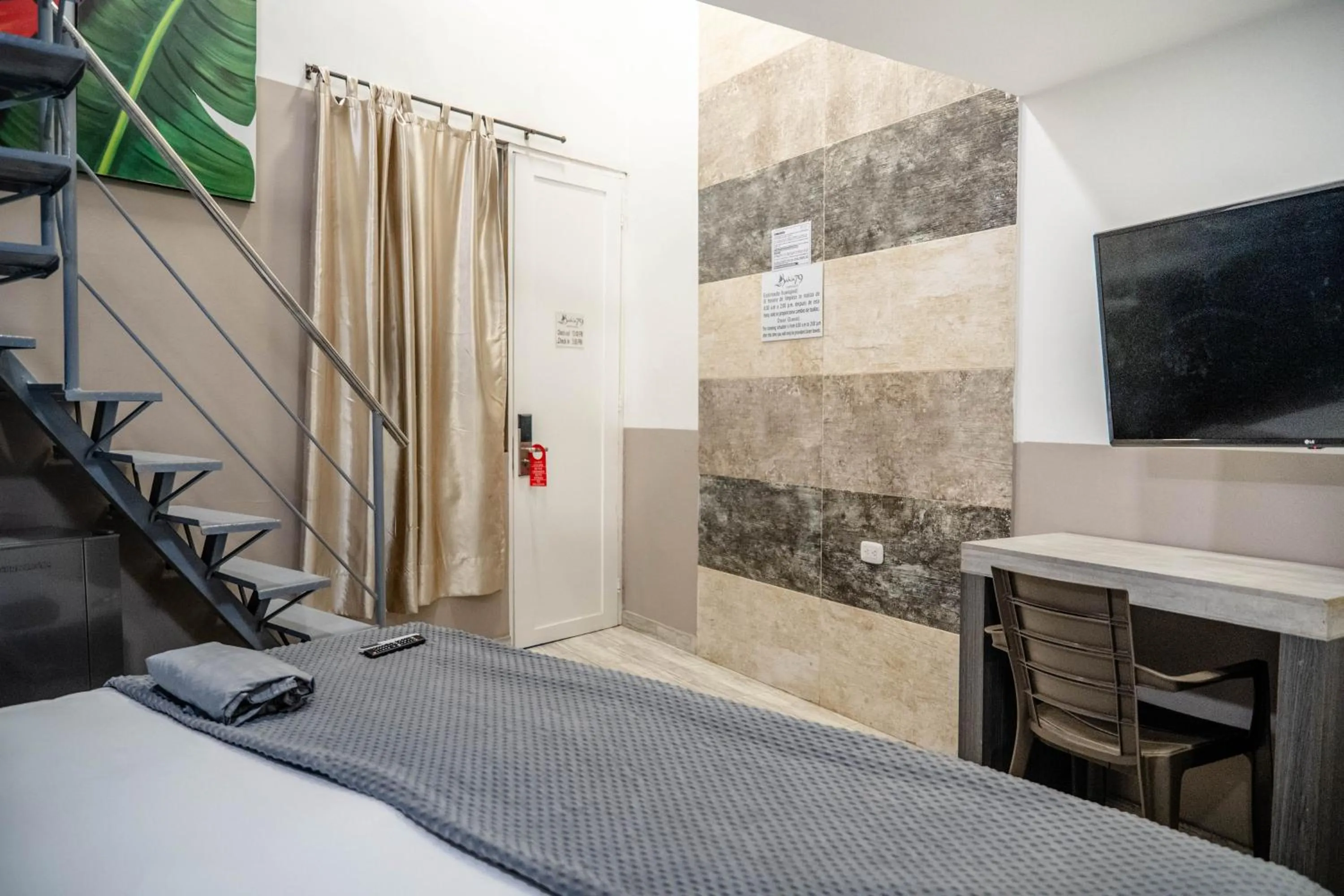 Bed in Bahia 79 Apartasuites Cerca al Centro