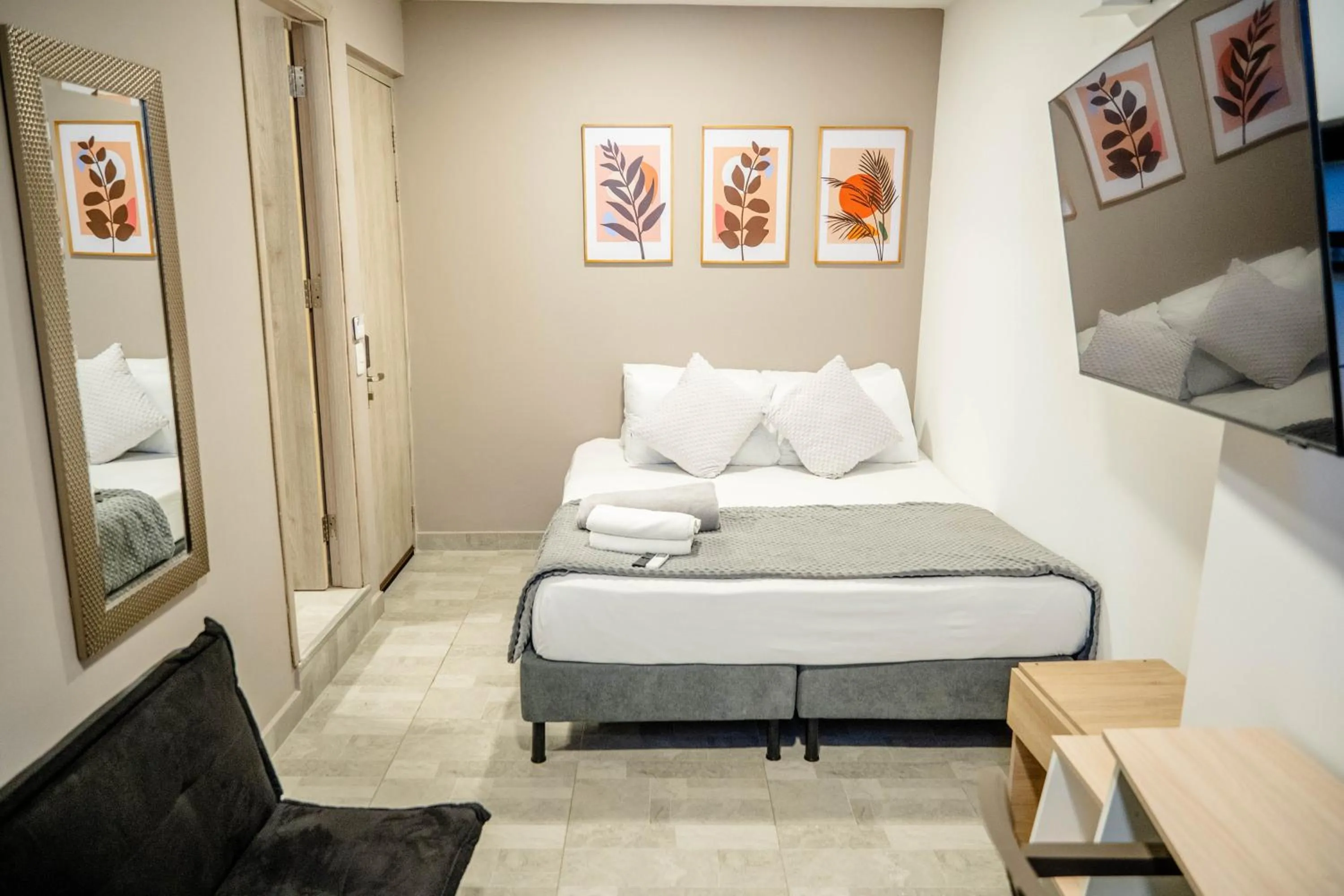 Bed in Bahia 79 Apartasuites Cerca al Centro