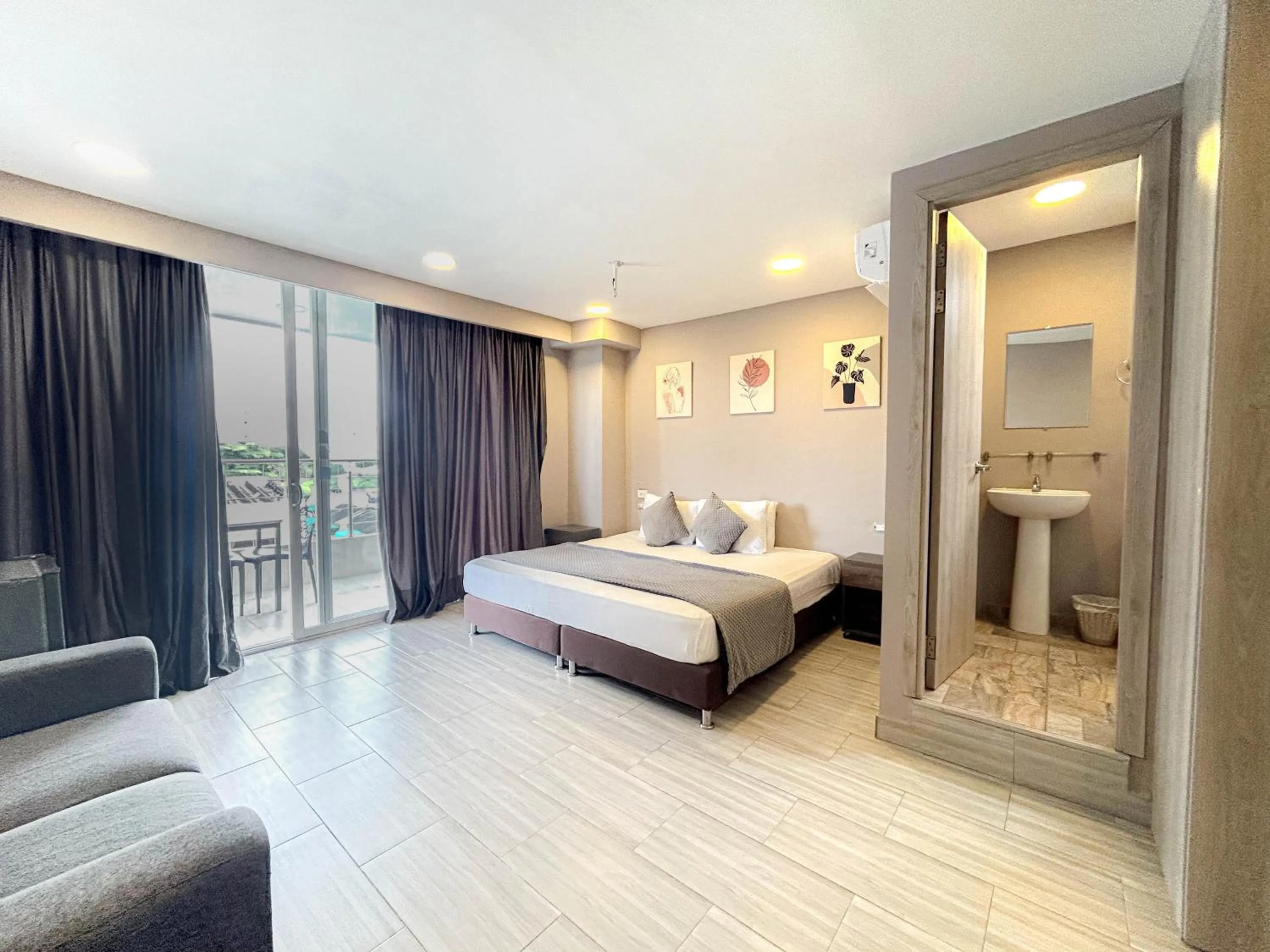 Bed in Bahia 79 Apartasuites Cerca al Centro