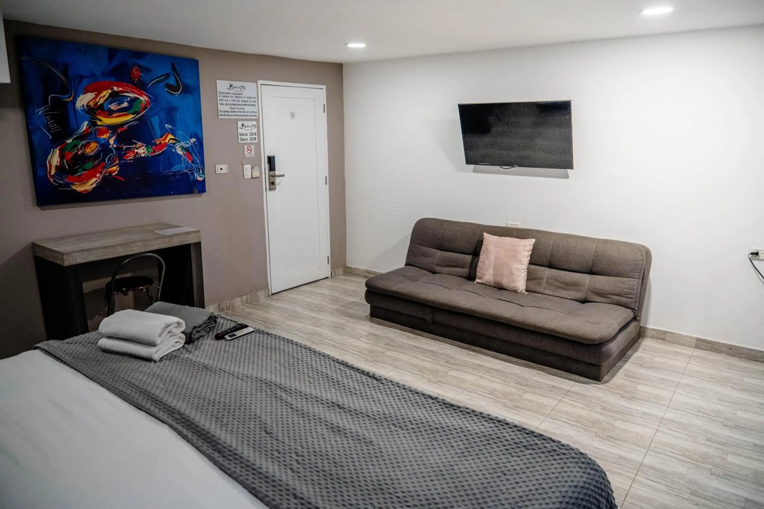 Bed in Bahia 79 Apartasuites Cerca al Centro