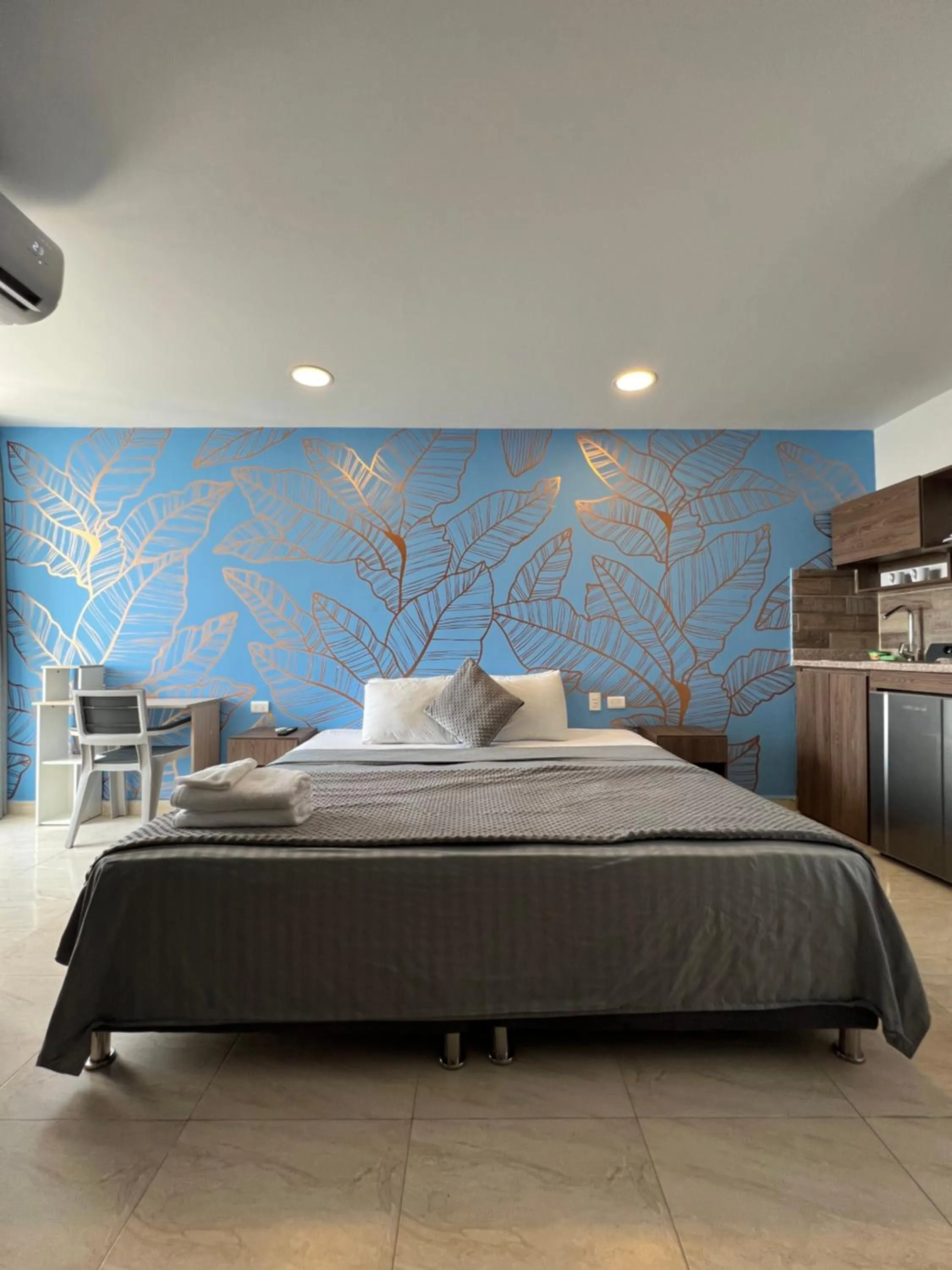 Bed in Bahia 79 Apartasuites Cerca al Centro