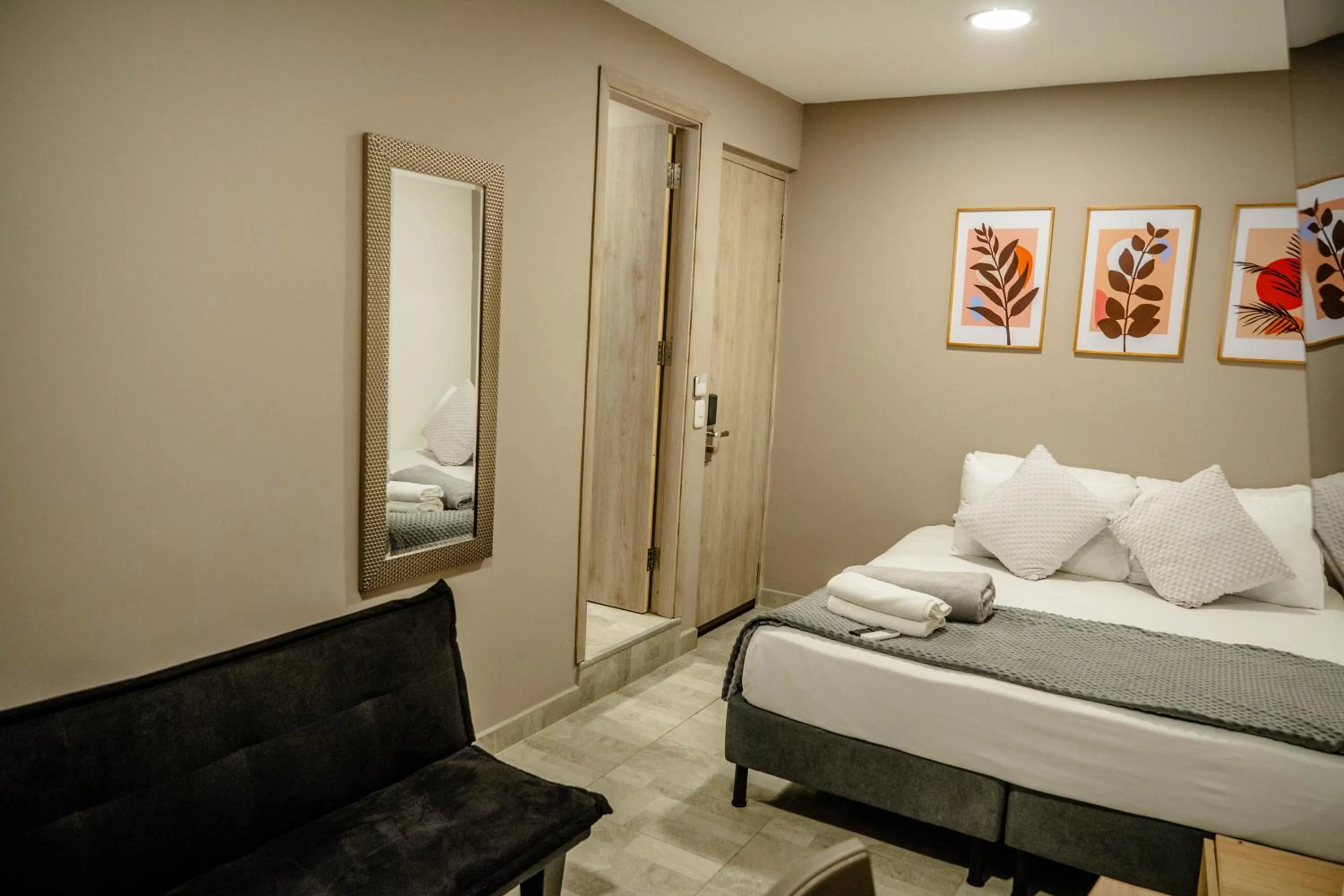 Bed in Bahia 79 Apartasuites Cerca al Centro