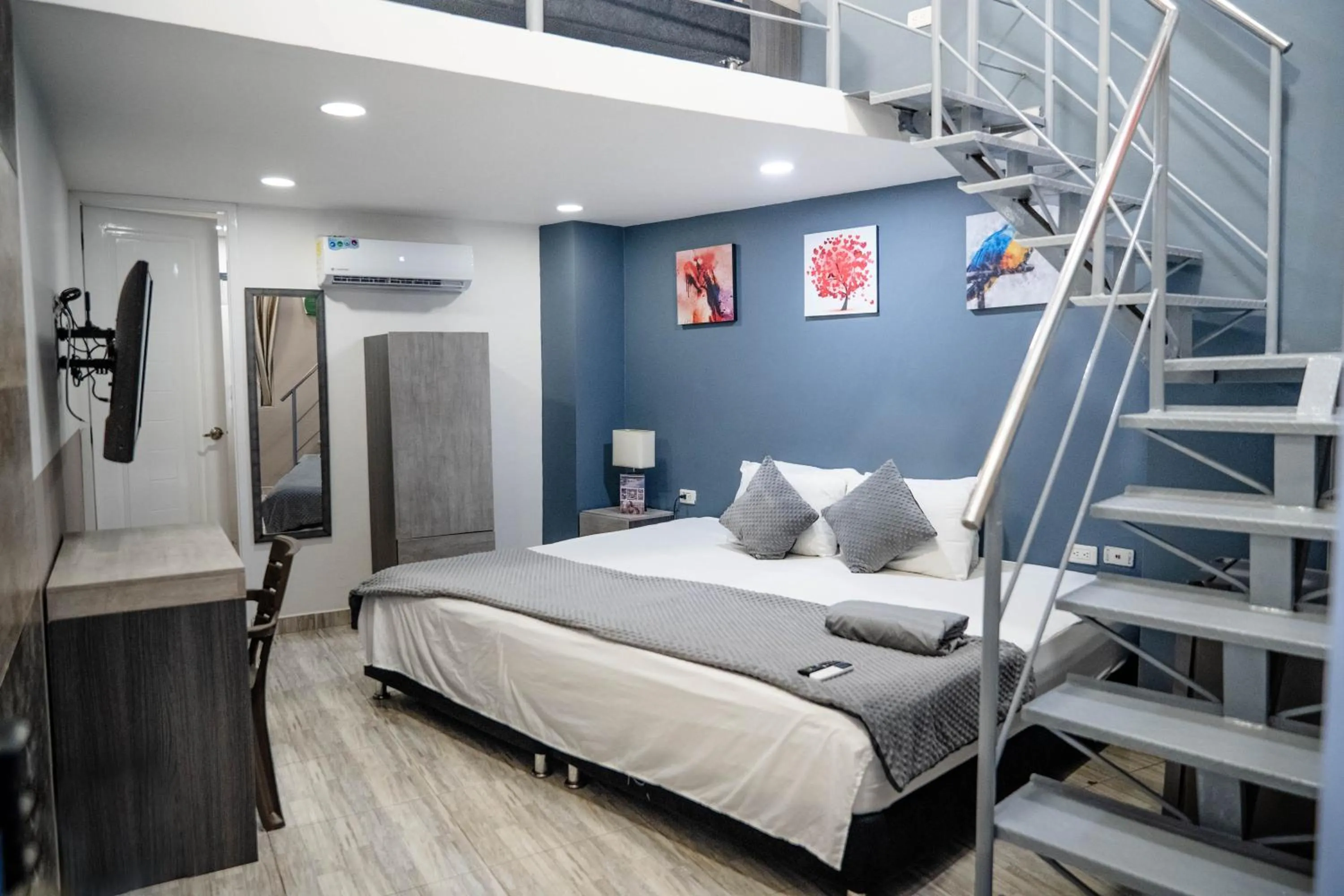 Bed in Bahia 79 Apartasuites Cerca al Centro