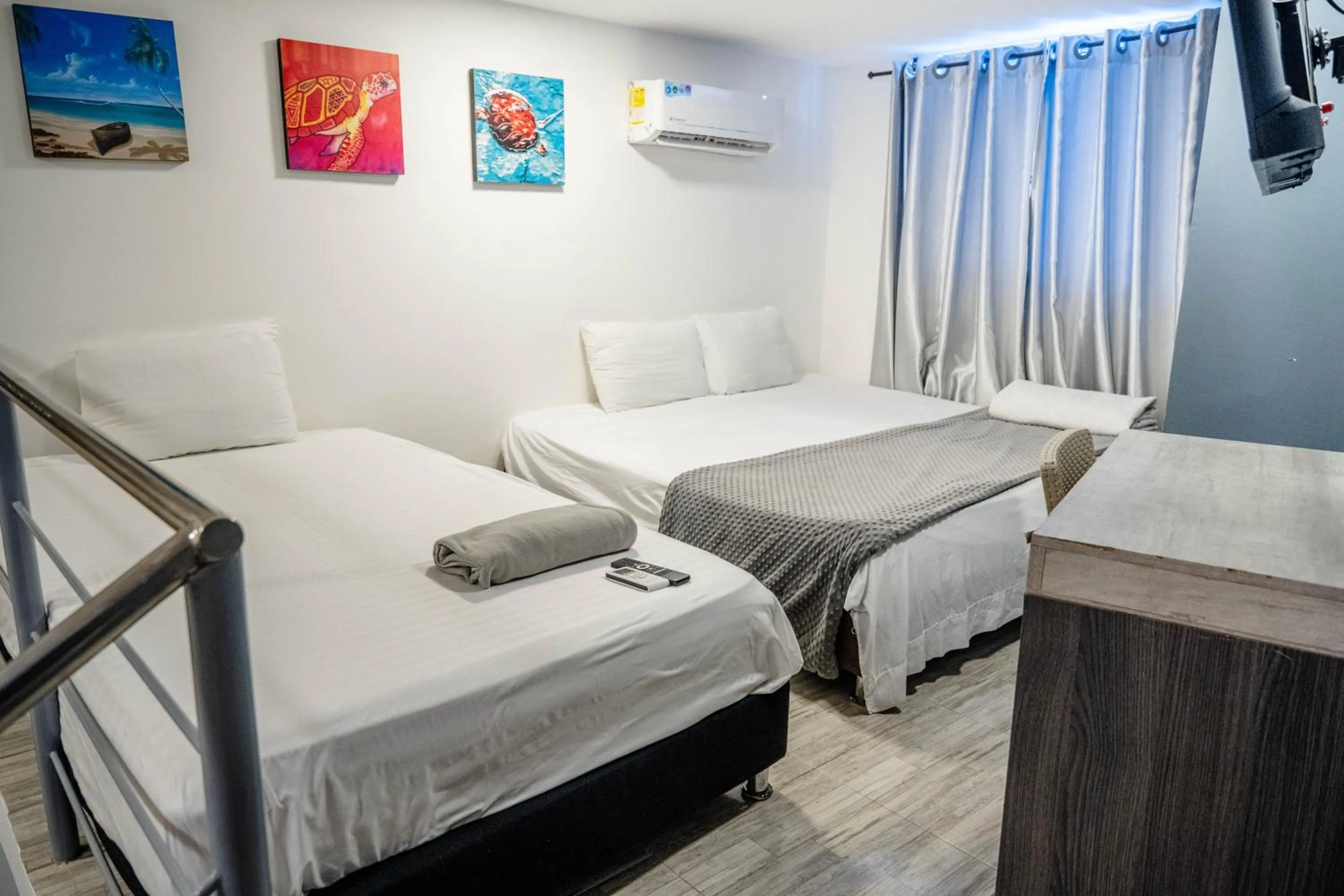 Bed in Bahia 79 Apartasuites Cerca al Centro