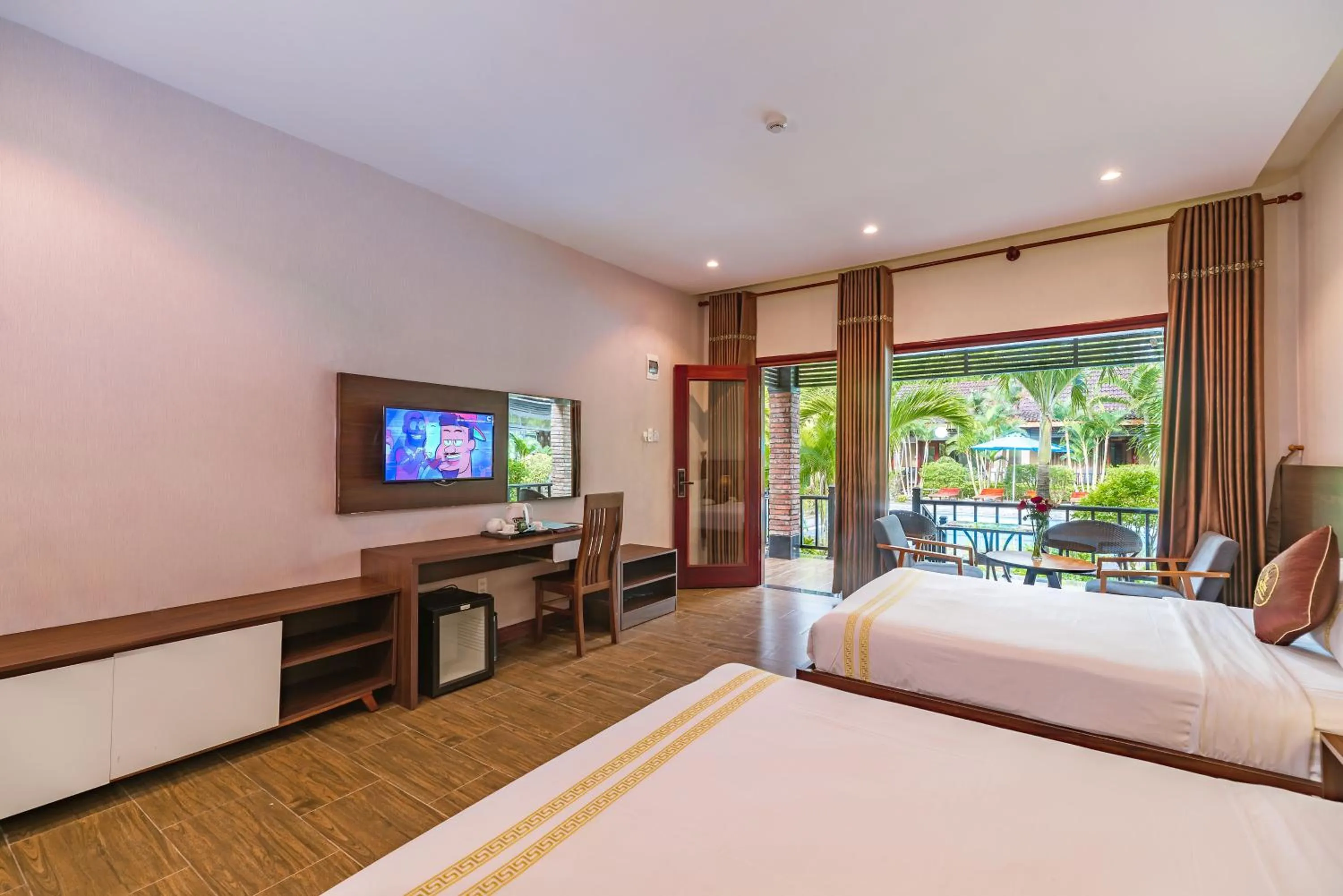 Communal lounge/ TV room, Bed in Qualia Resort Phu Quoc