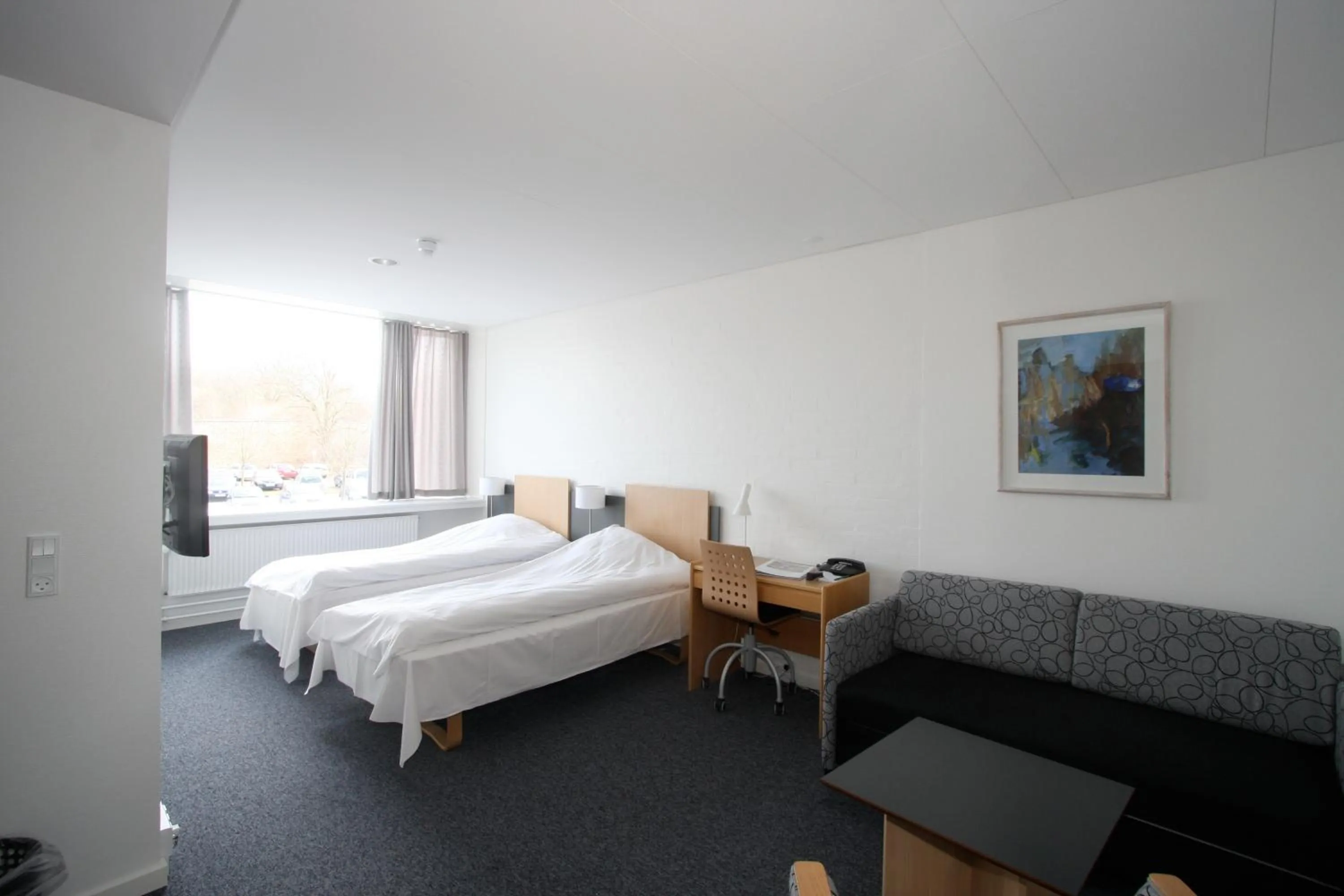 Photo of the whole room, Bed in Vingsted Hotel & Konferencecenter