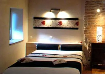 Photo of the whole room, Bed in L'Ancien Presbytère