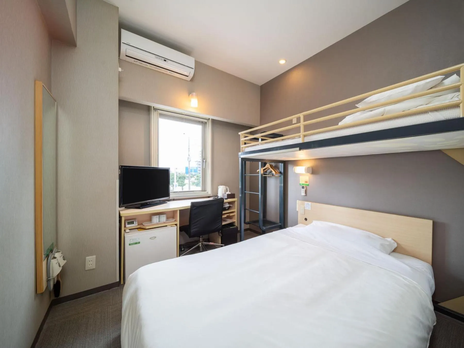 Bed in Super Hotel Fuji Inter