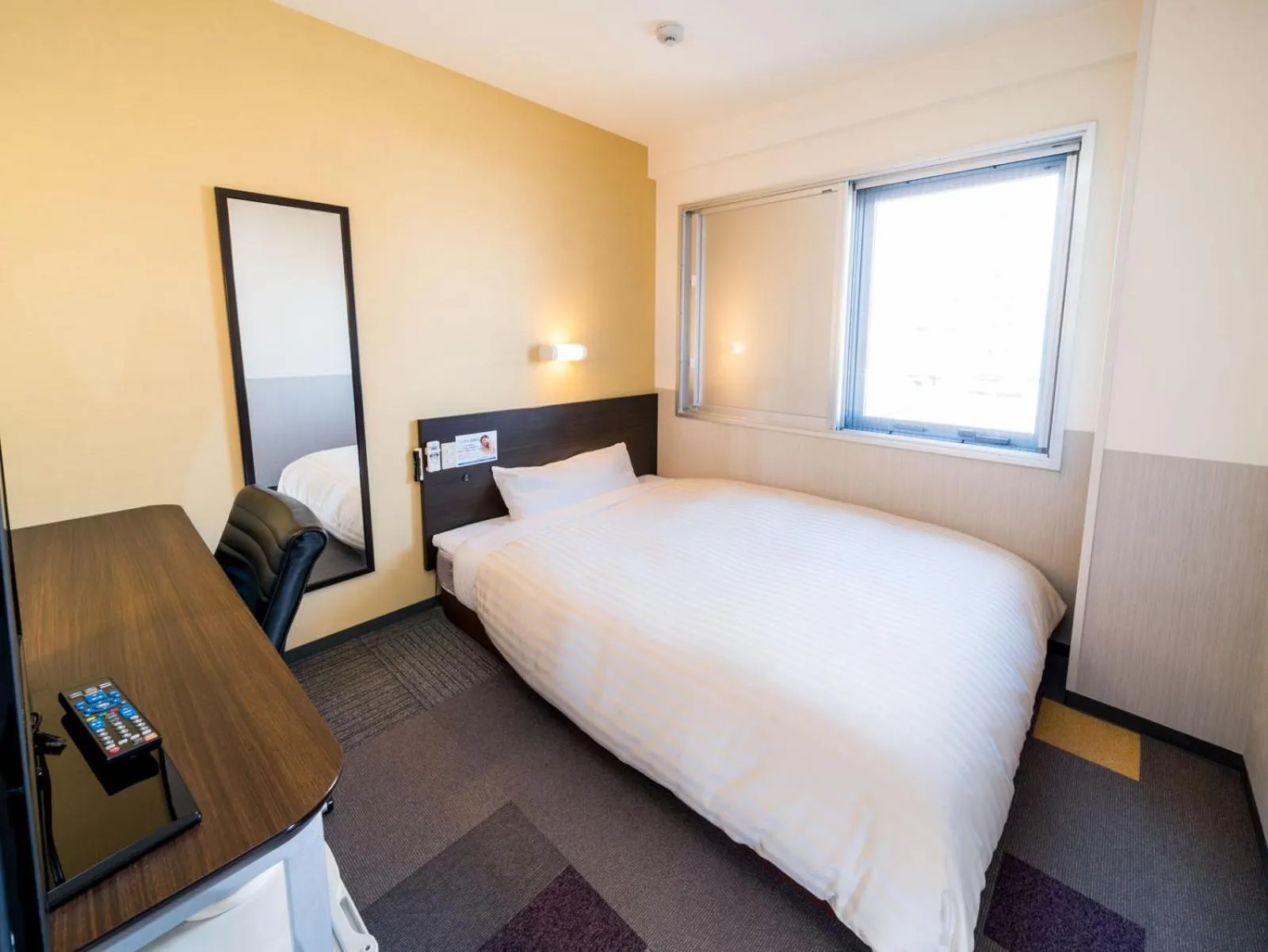 Bed in Super Hotel Fuji Inter