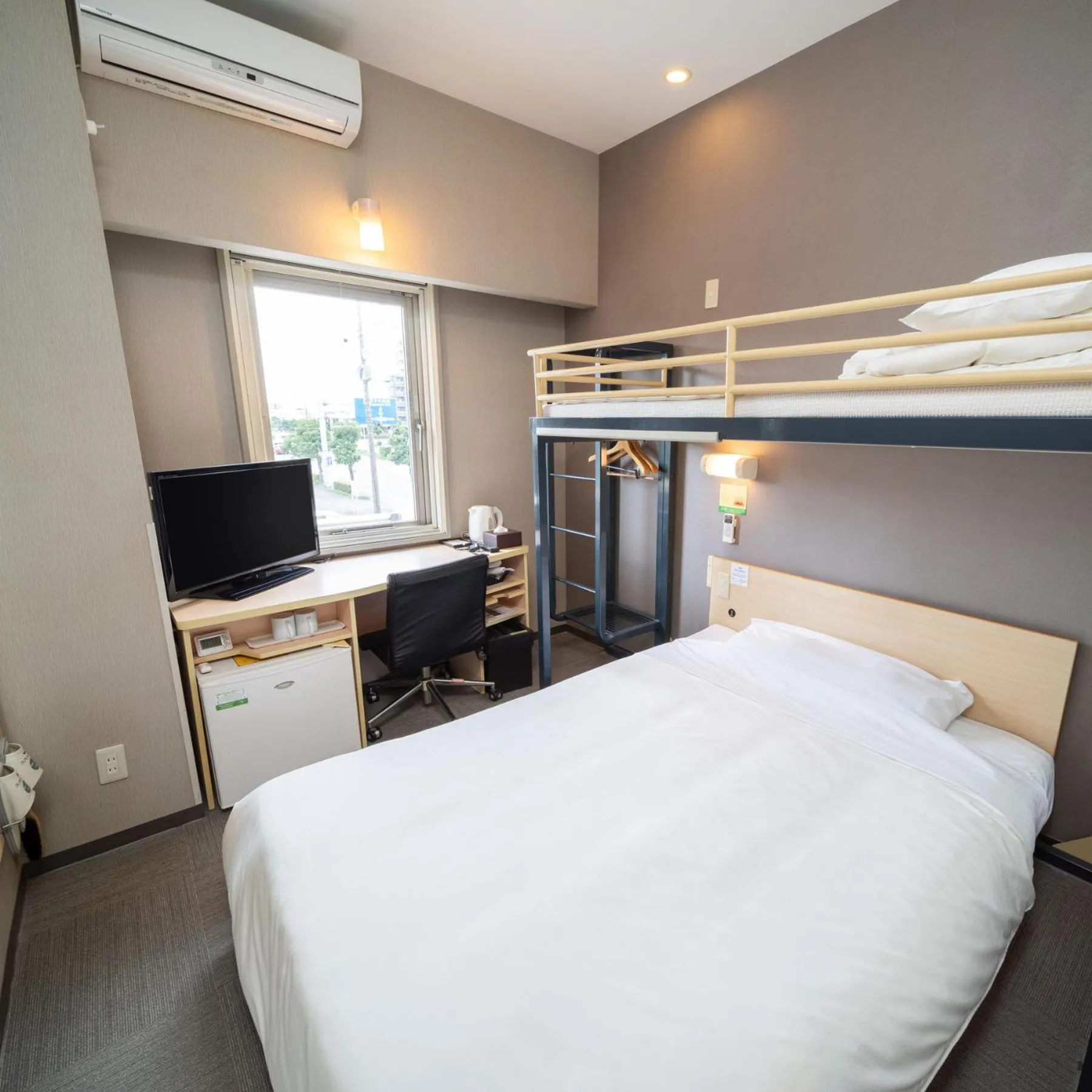 Bed in Super Hotel Fuji Inter