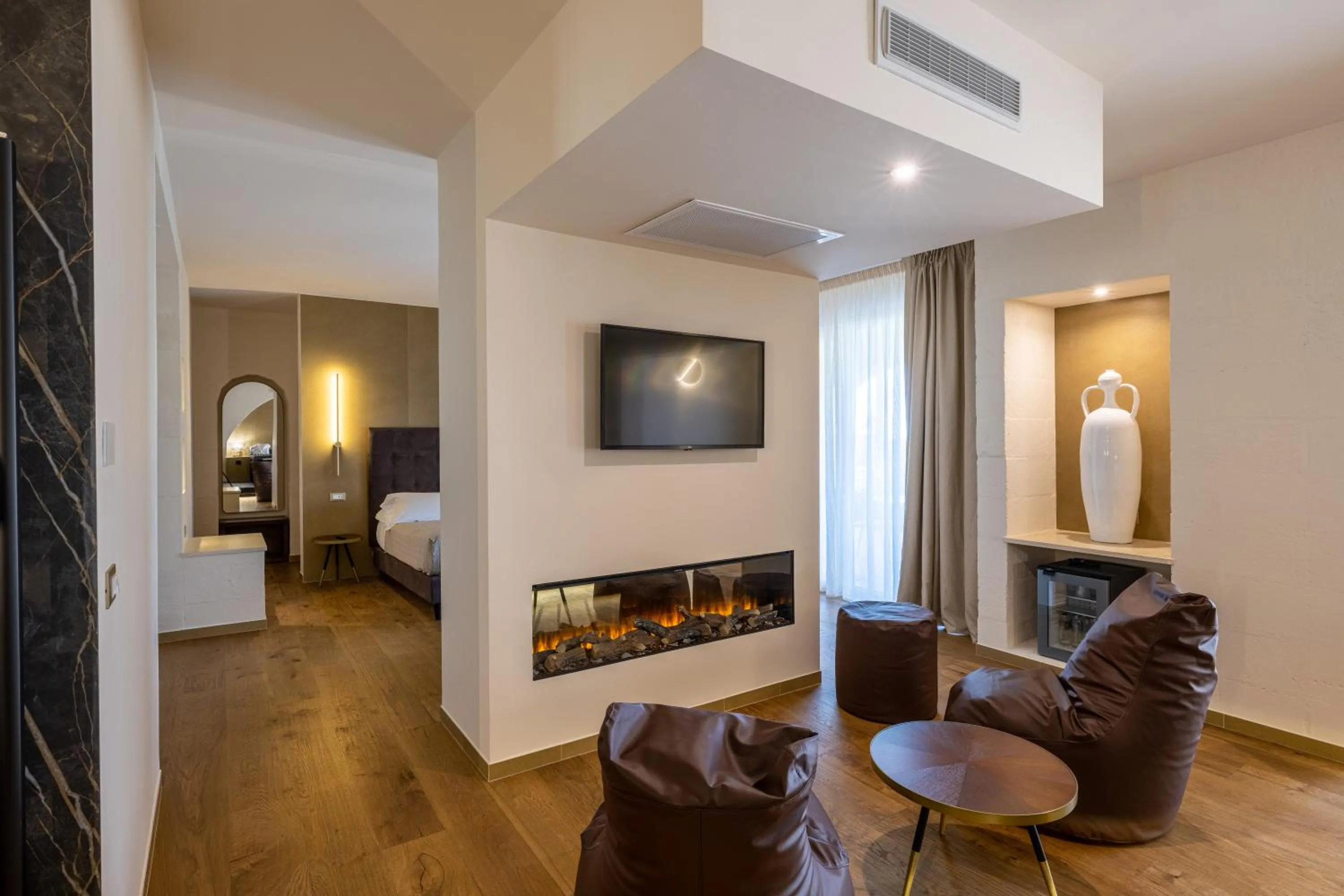 Communal lounge/ TV room, Bed in Relais Masseria Caselli