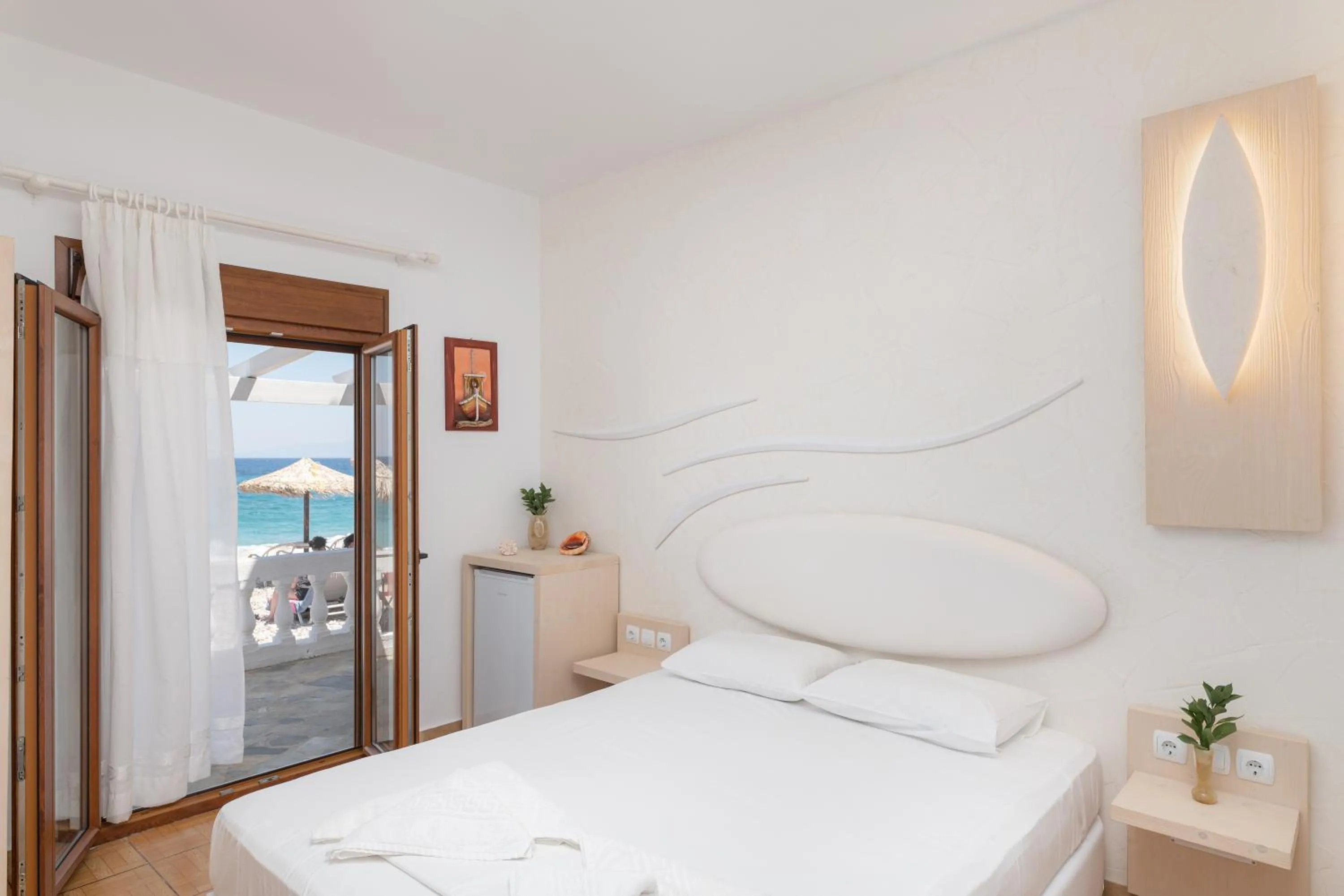 Bed in Kokkari Beach Hotel