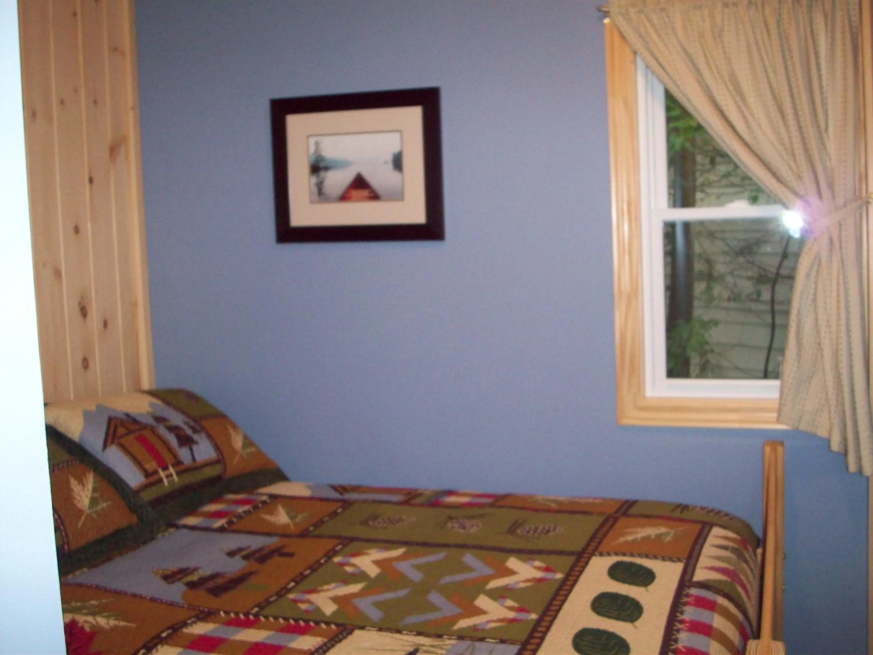 Bed in Lakewoods Cottage