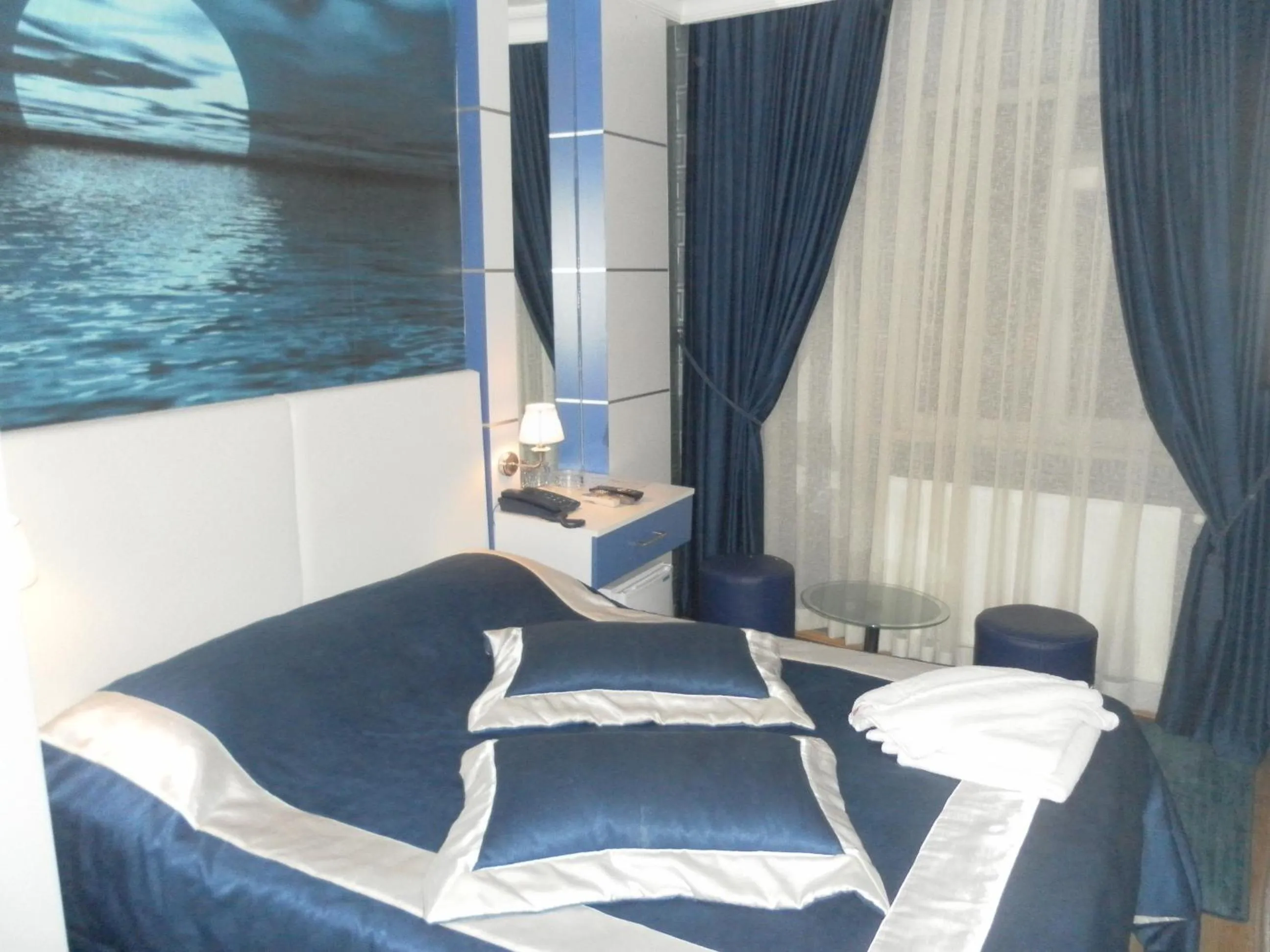 Bedroom in Hotel La White