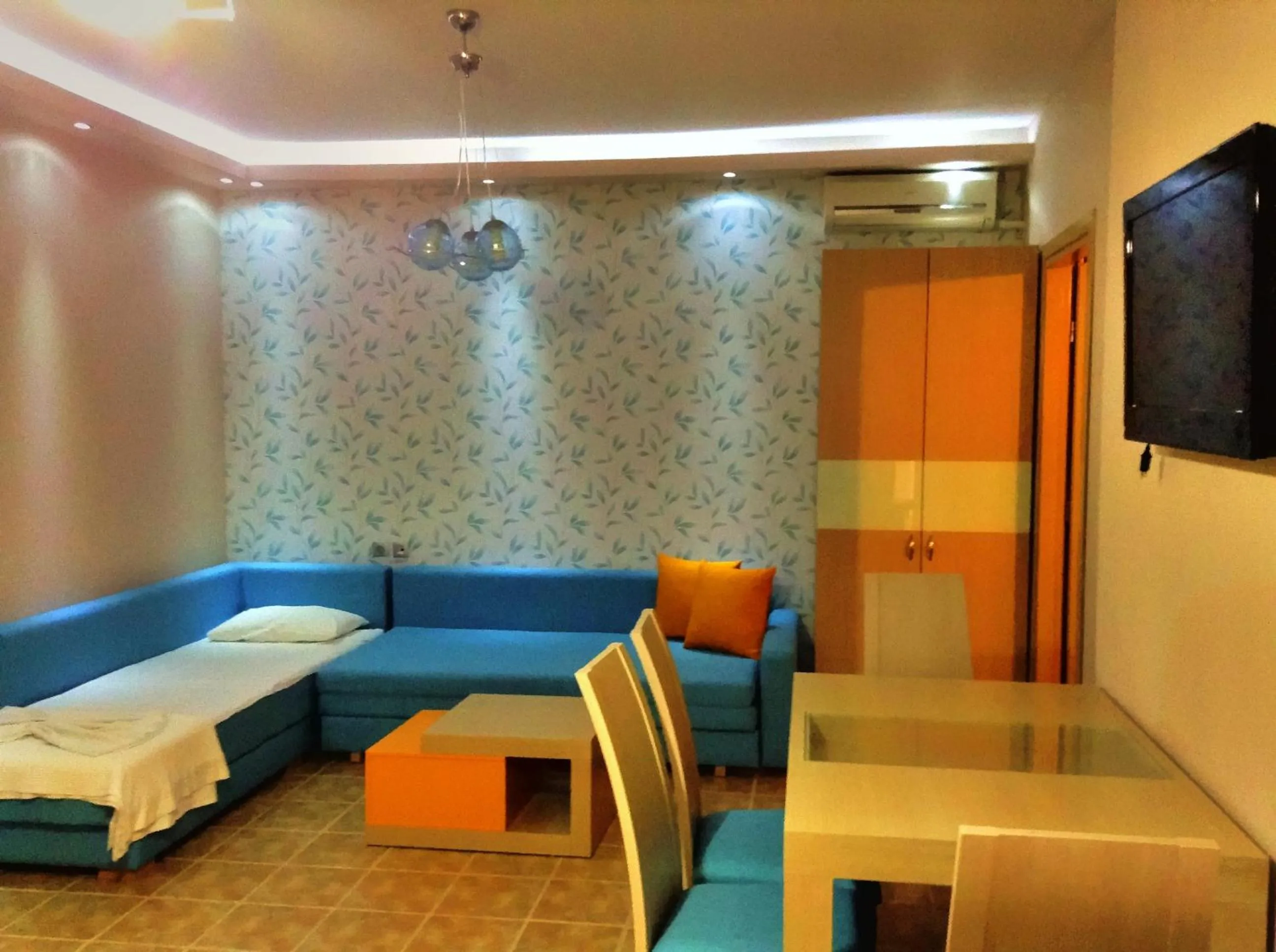 Seating area, Bed in Maranton Beach Hotel