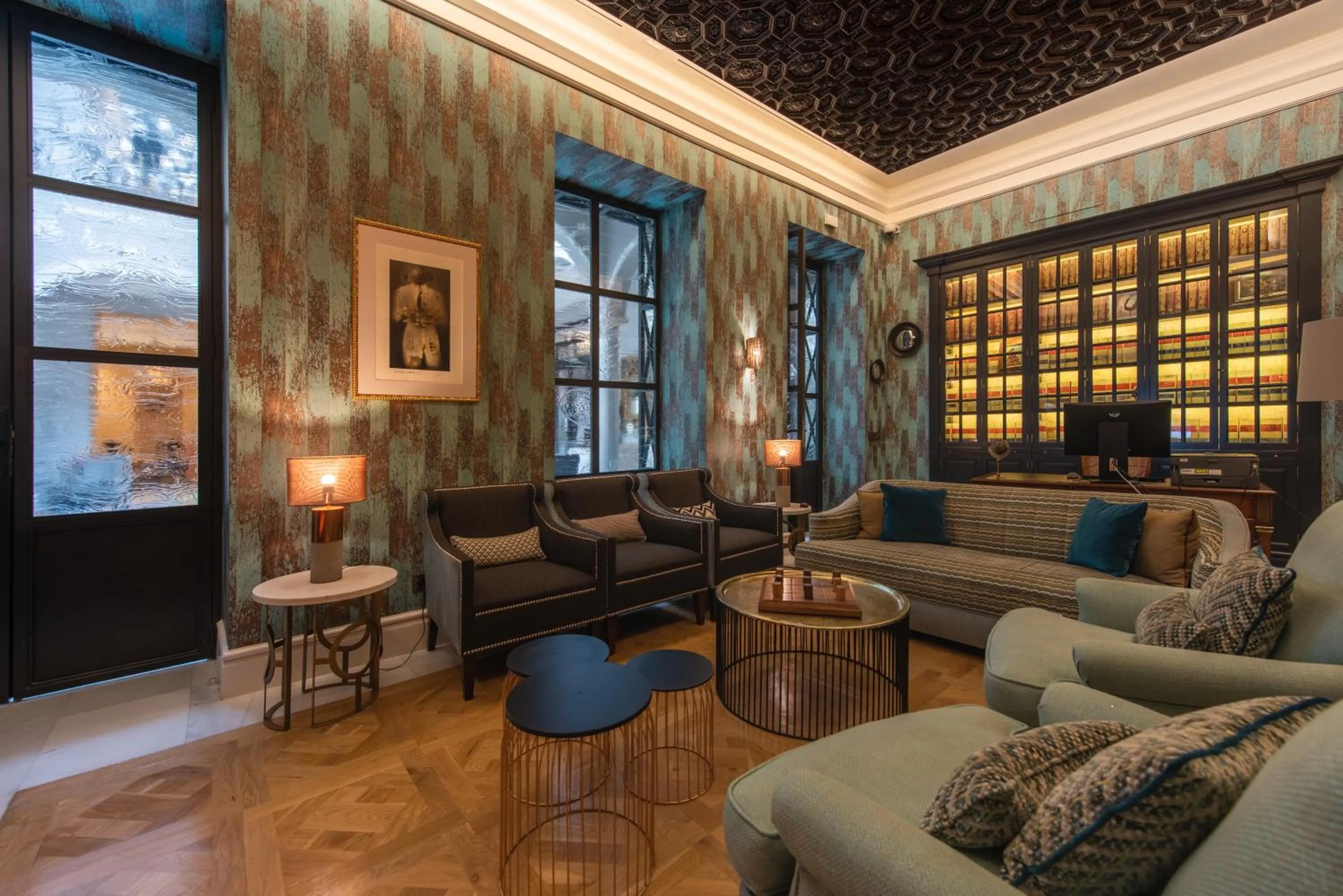 Communal lounge/ TV room in Hotel Casa Palacio María Luisa