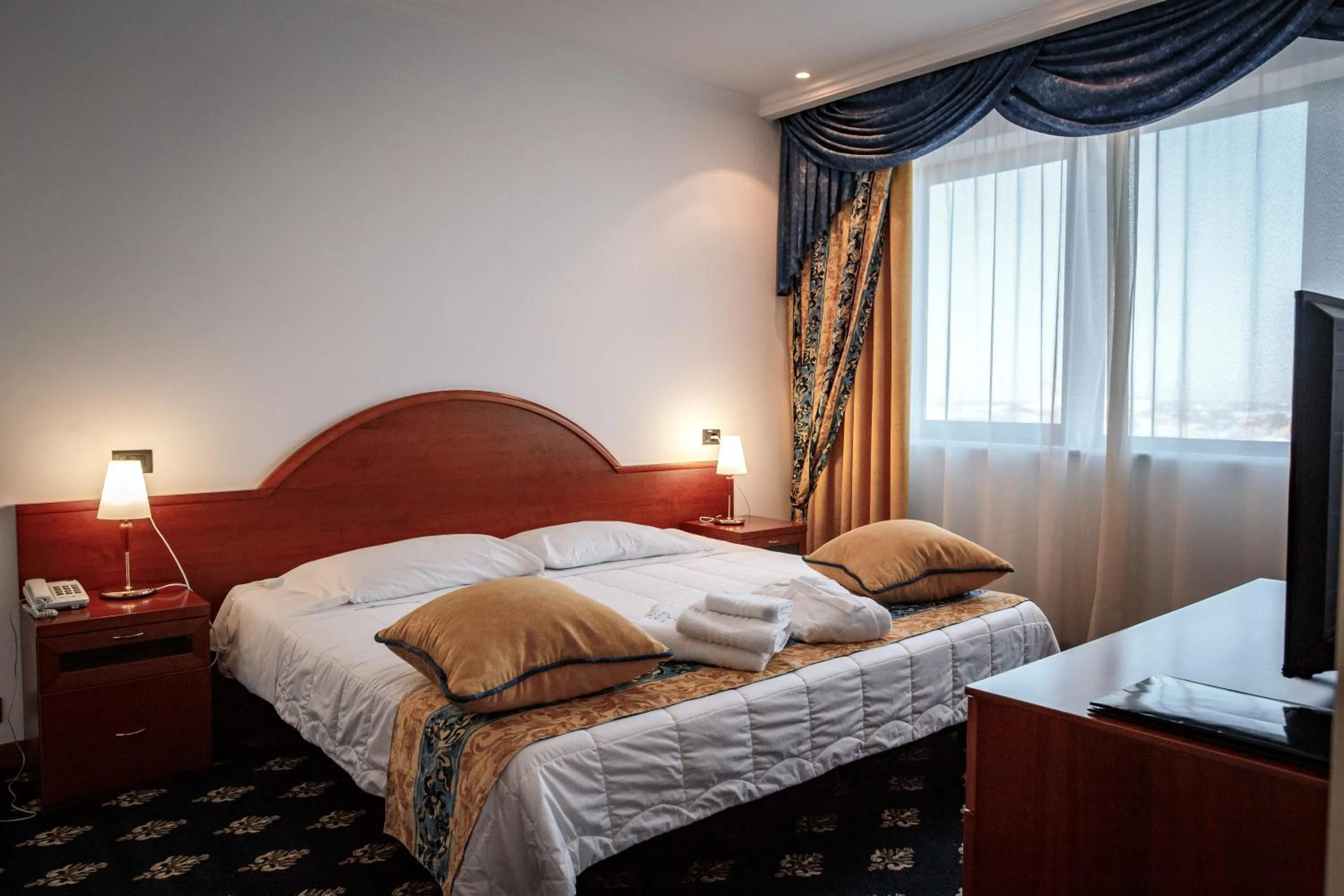 Bed in River Palace Hotel