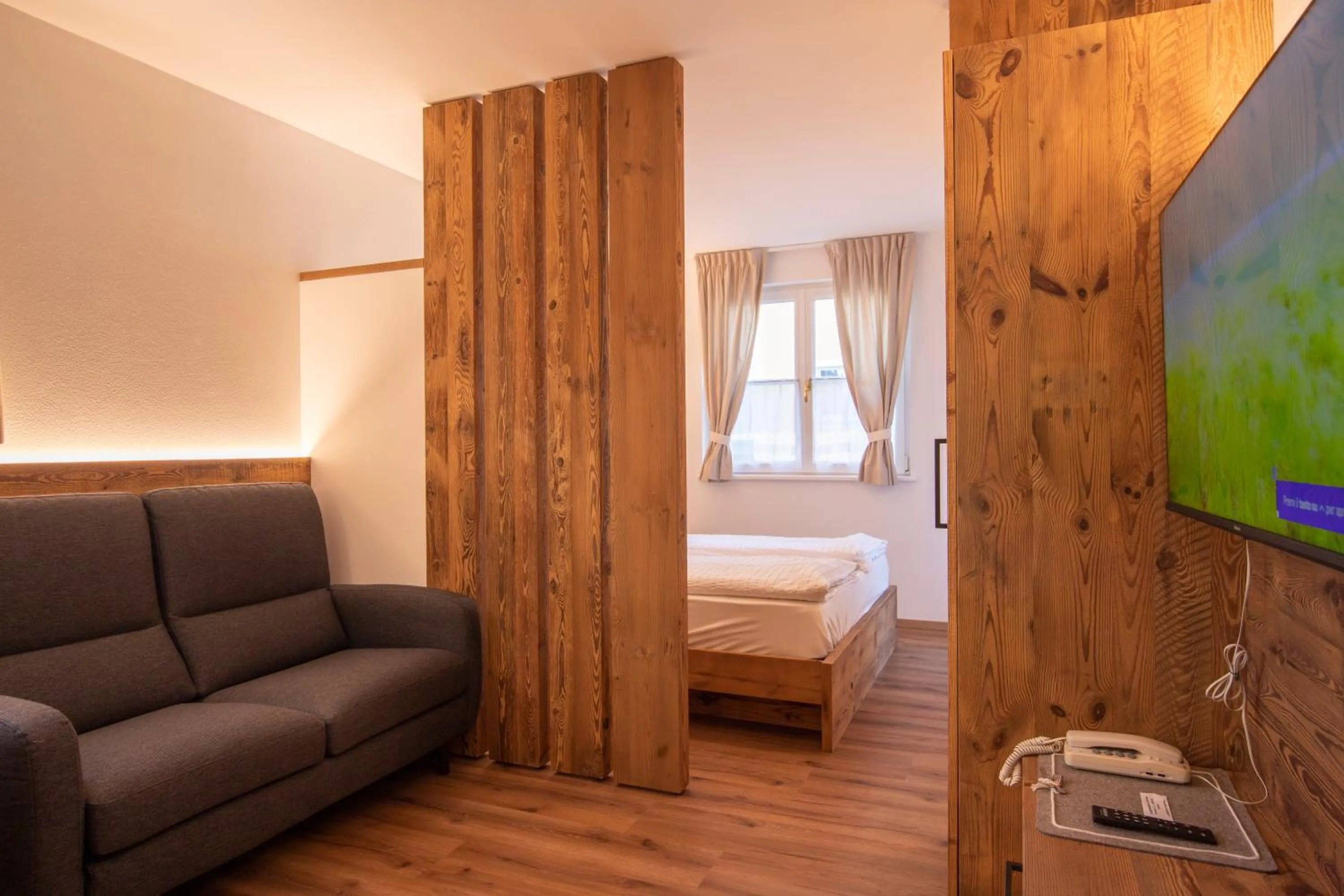 Living room, Bed in Residence Montebel