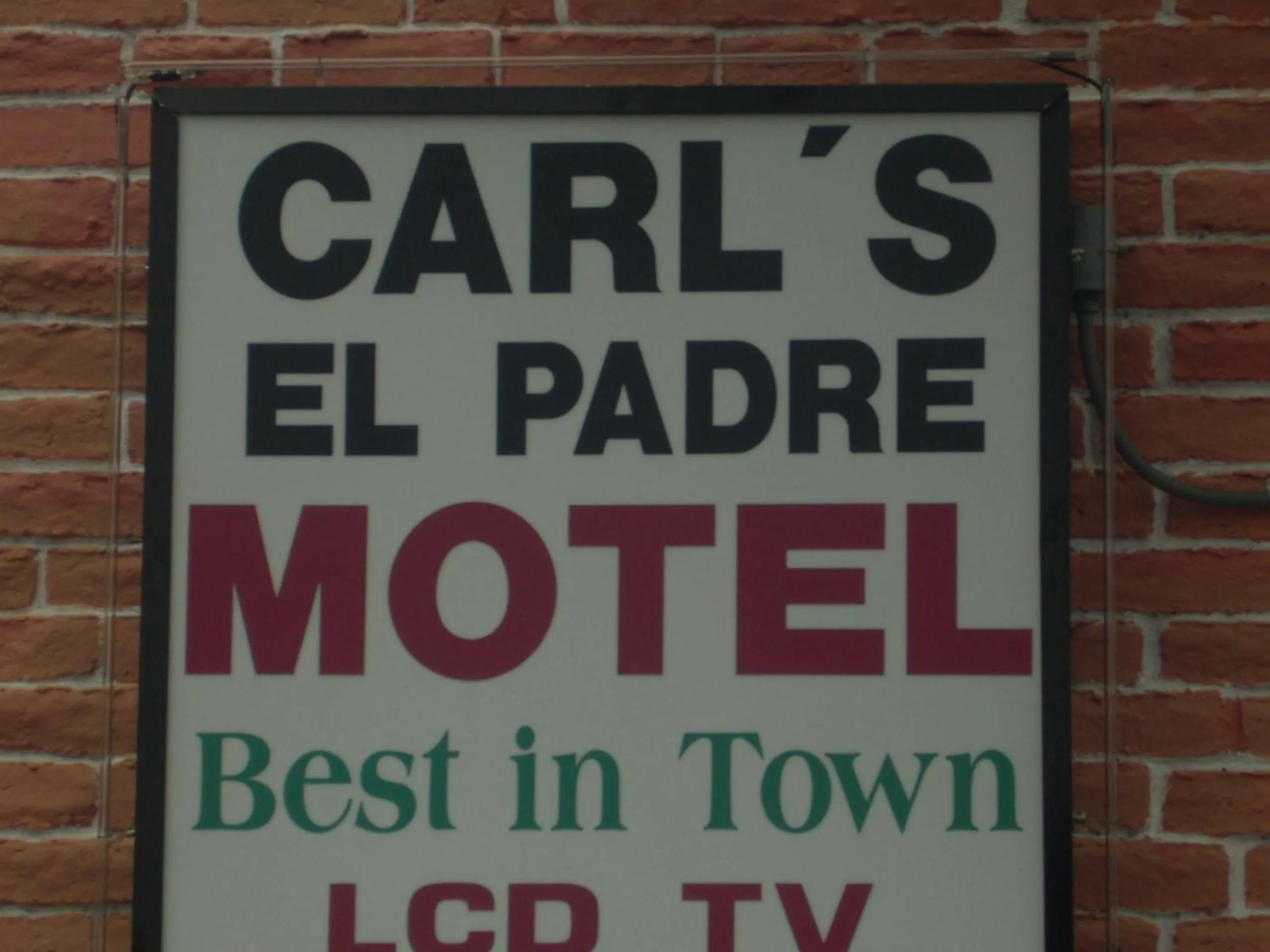 Property logo or sign in Carl's El Padre Motel