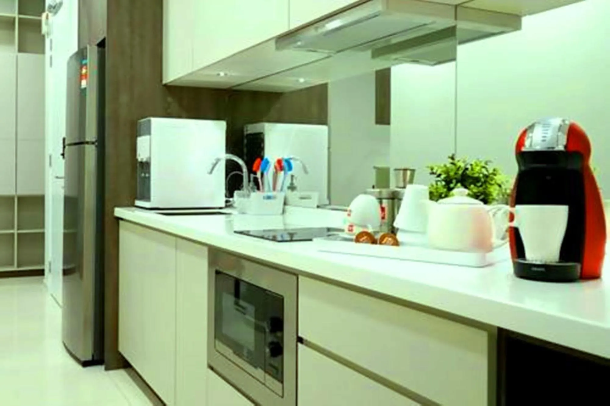 Kitchen or kitchenette in Platinum Suites at Swiss Garden