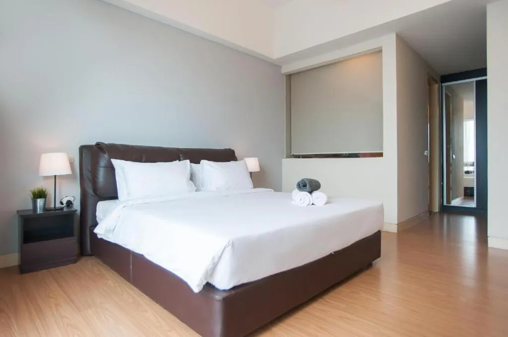 Bed in Platinum Suites at Swiss Garden