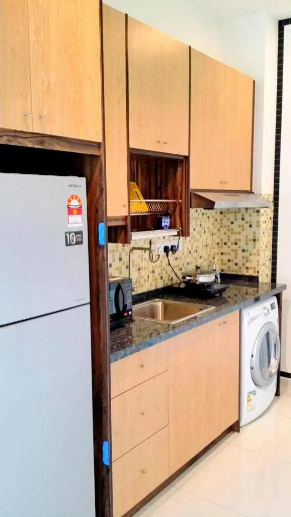 Kitchen or kitchenette in Platinum Suites at Swiss Garden