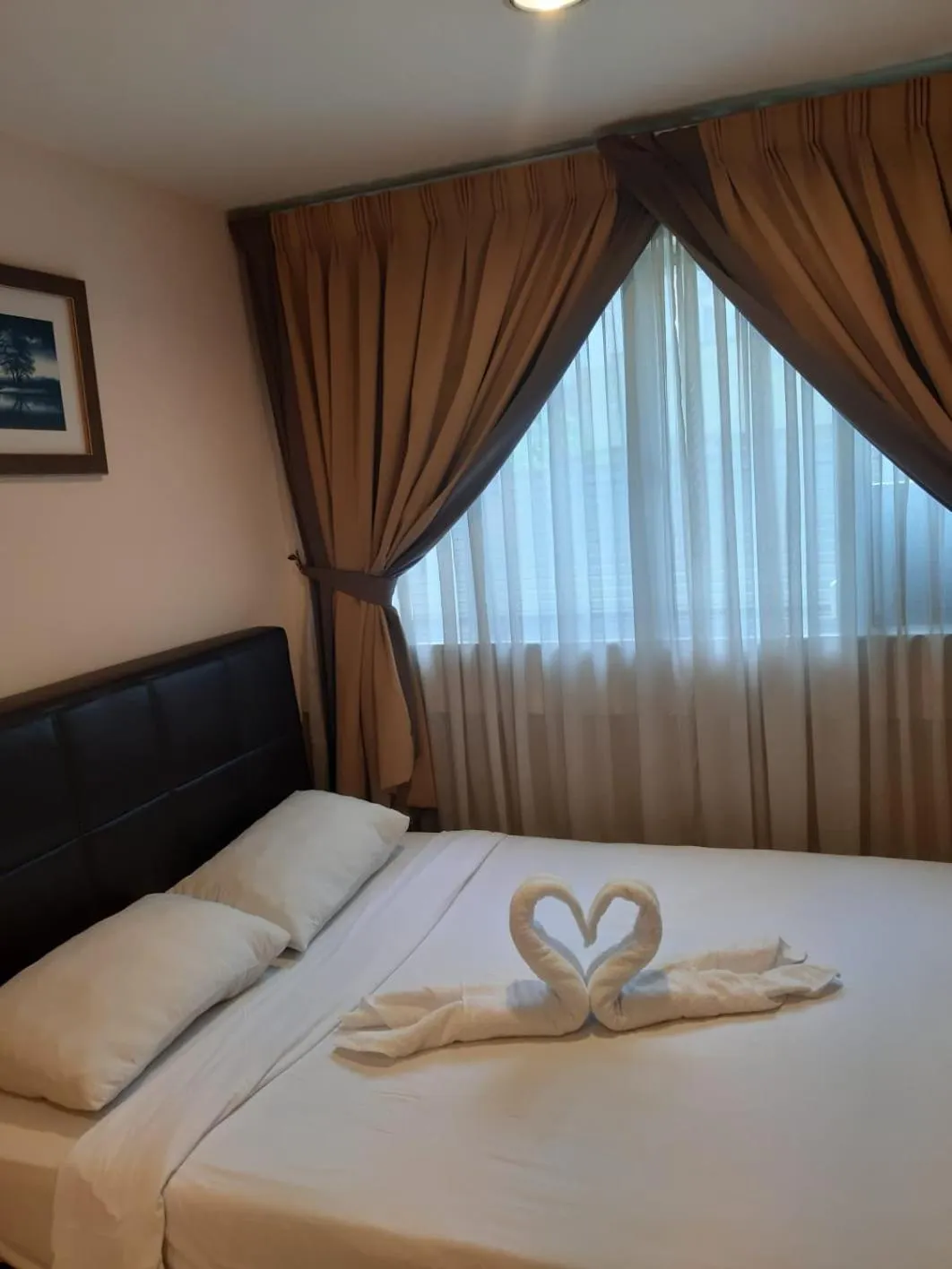 Bed in Platinum Suites at Swiss Garden