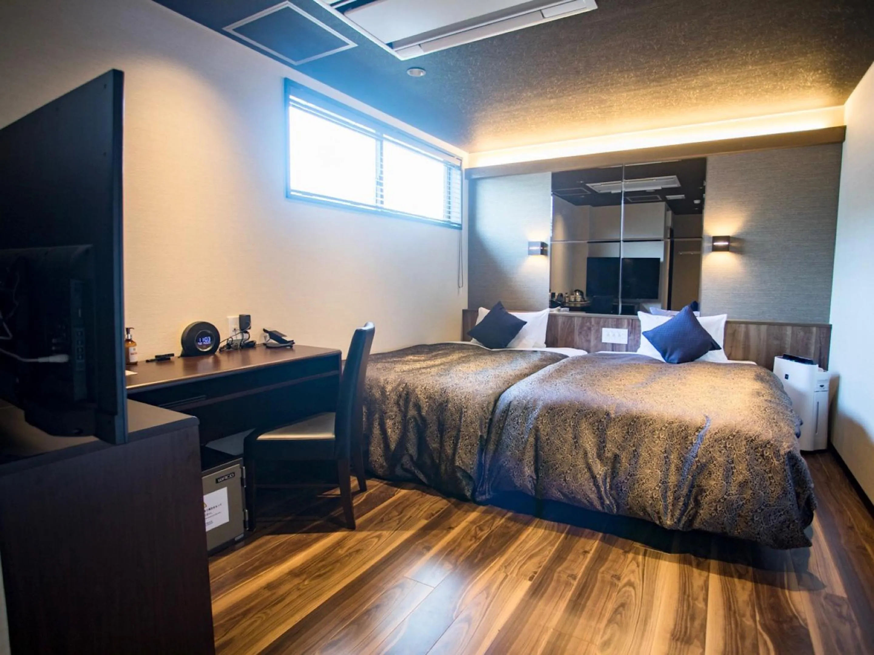 Bed in LiVEMAX RESORT Kyotango Sea Front