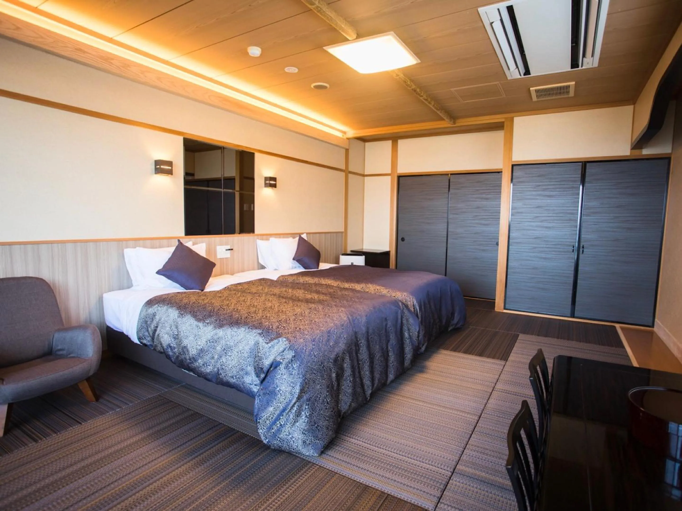 Bed in LiVEMAX RESORT Kyotango Sea Front