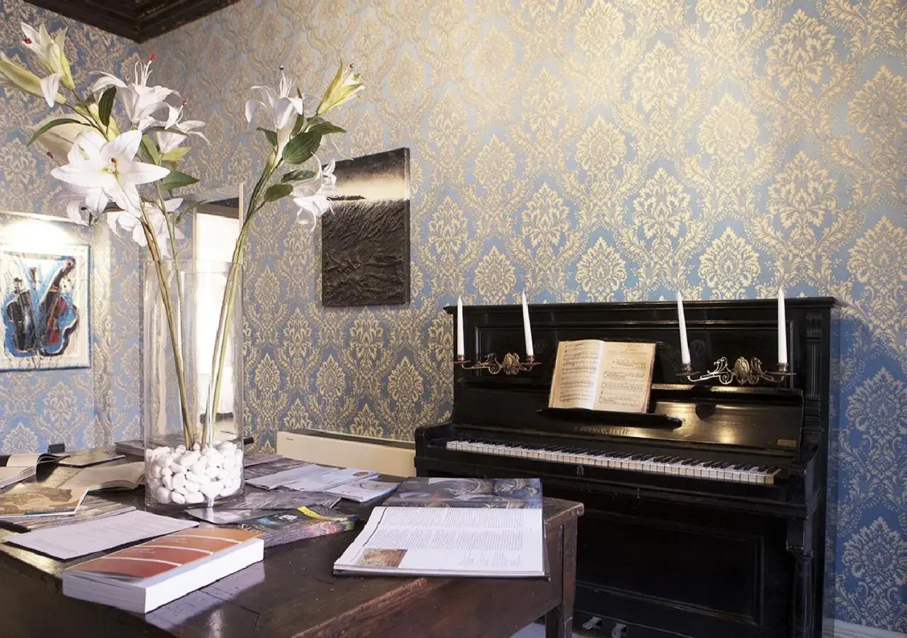 Lounge or bar in Charming Palace Santa Fosca Lounge or bar in Charming Palace Santa Fosca