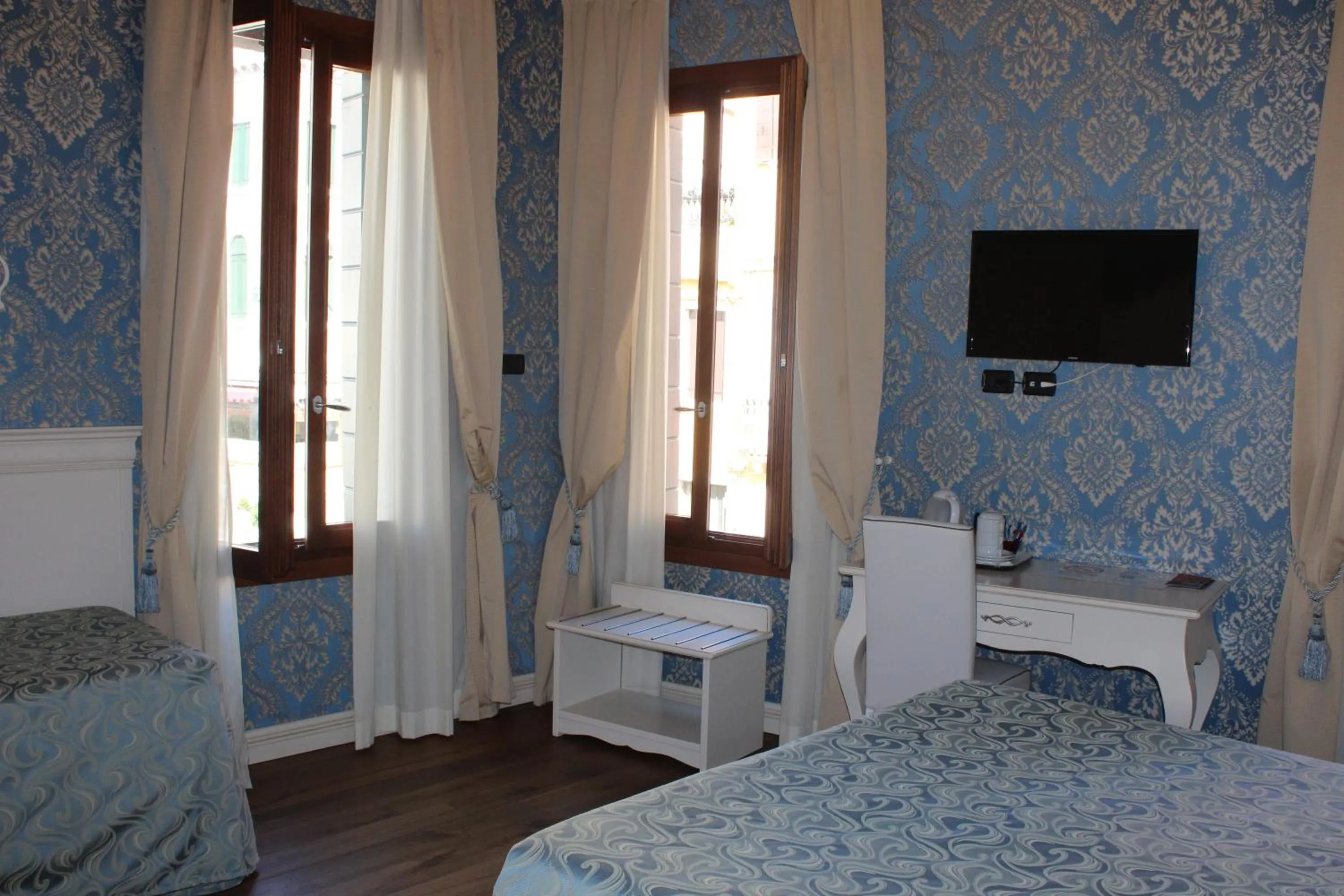 Bed in Charming Palace Santa Fosca