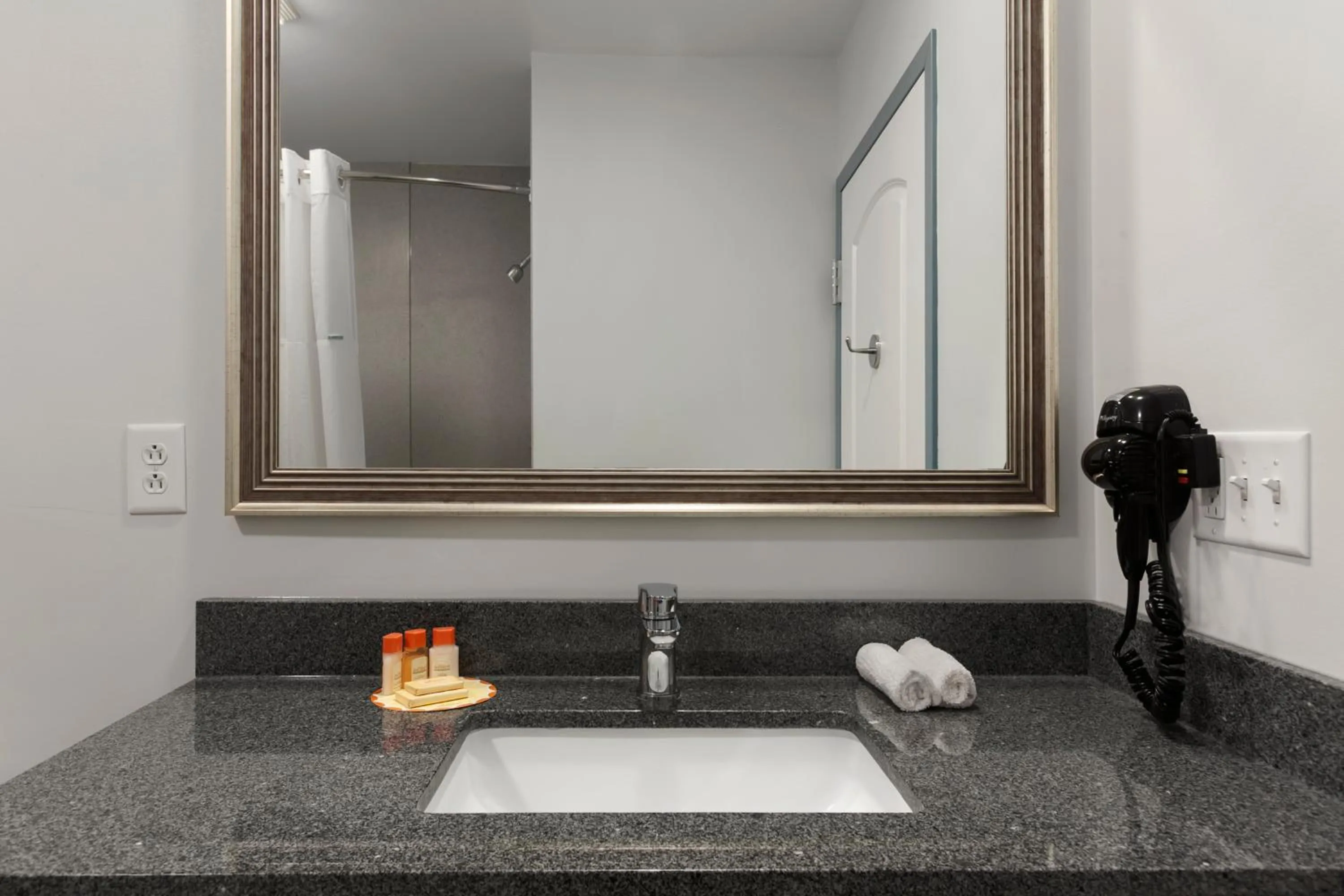 Bathroom in Days Inn by Wyndham Watertown Fort Drum