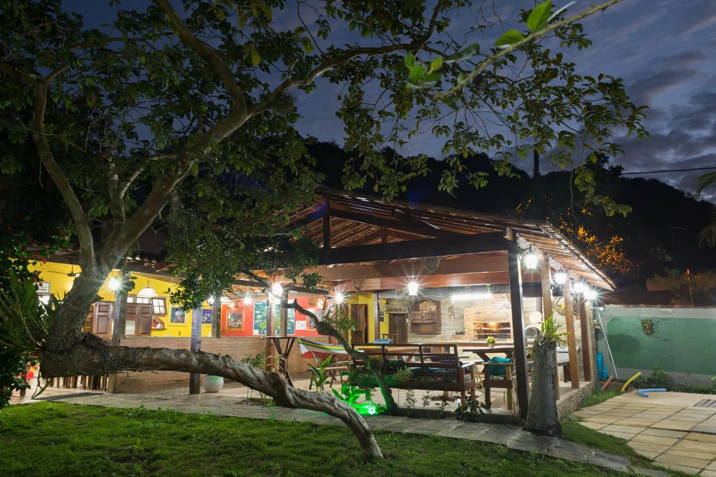 Communal lounge/ TV room in Pousada Recanto dos Lima