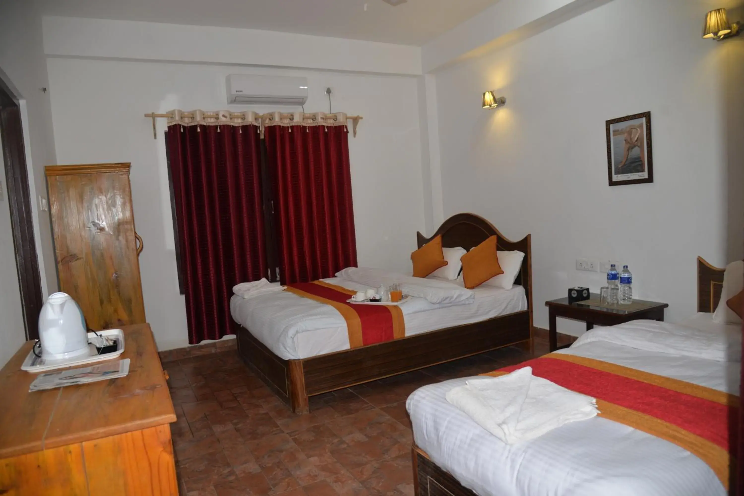 Triple Room with Balcony in Hotel Chitwan Park Village Triple Room with Balcony in Hotel Chitwan Park Village