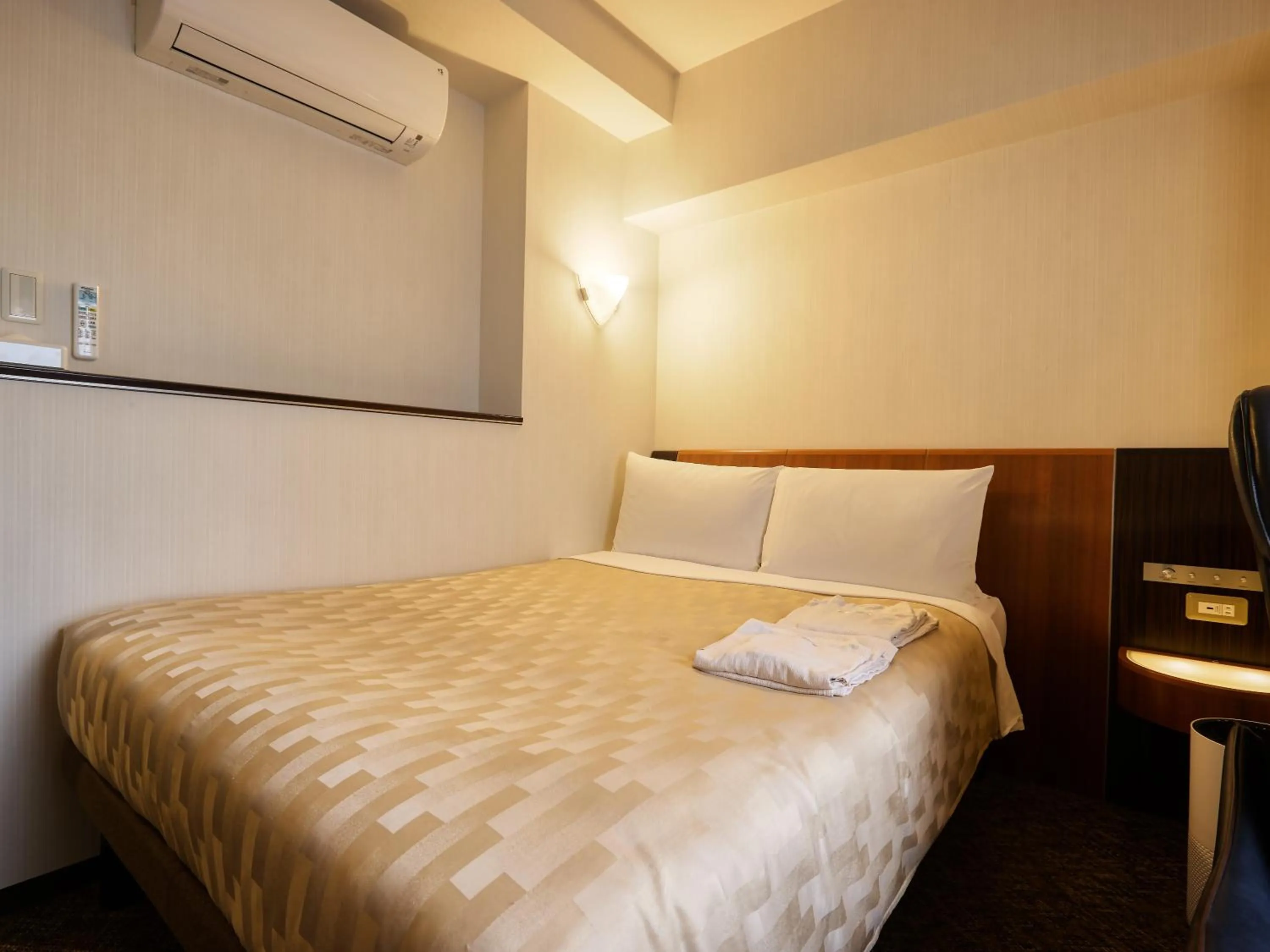 Photo of the whole room, Bed in GRG Hotel Naha