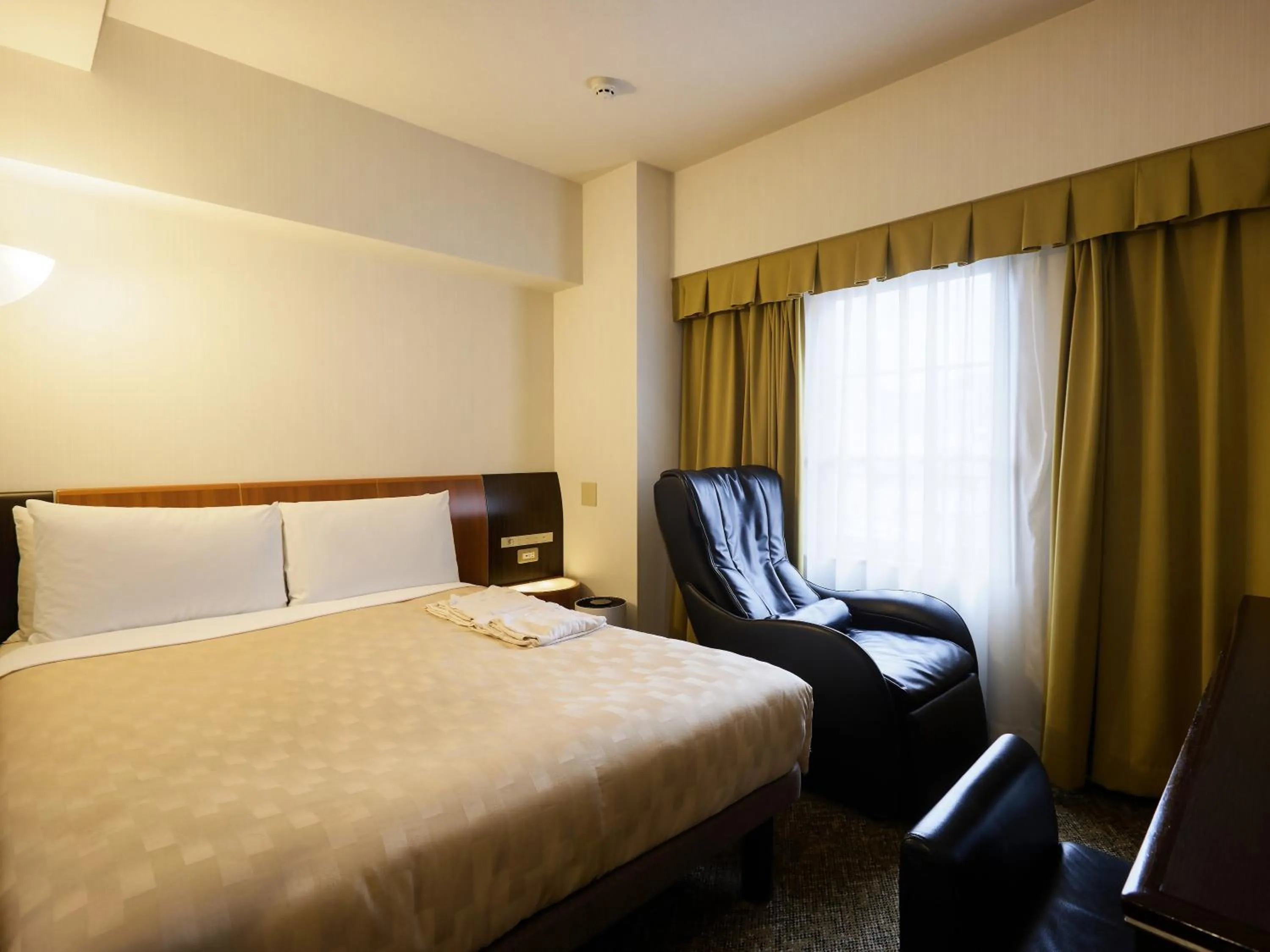 Photo of the whole room, Bed in GRG Hotel Naha