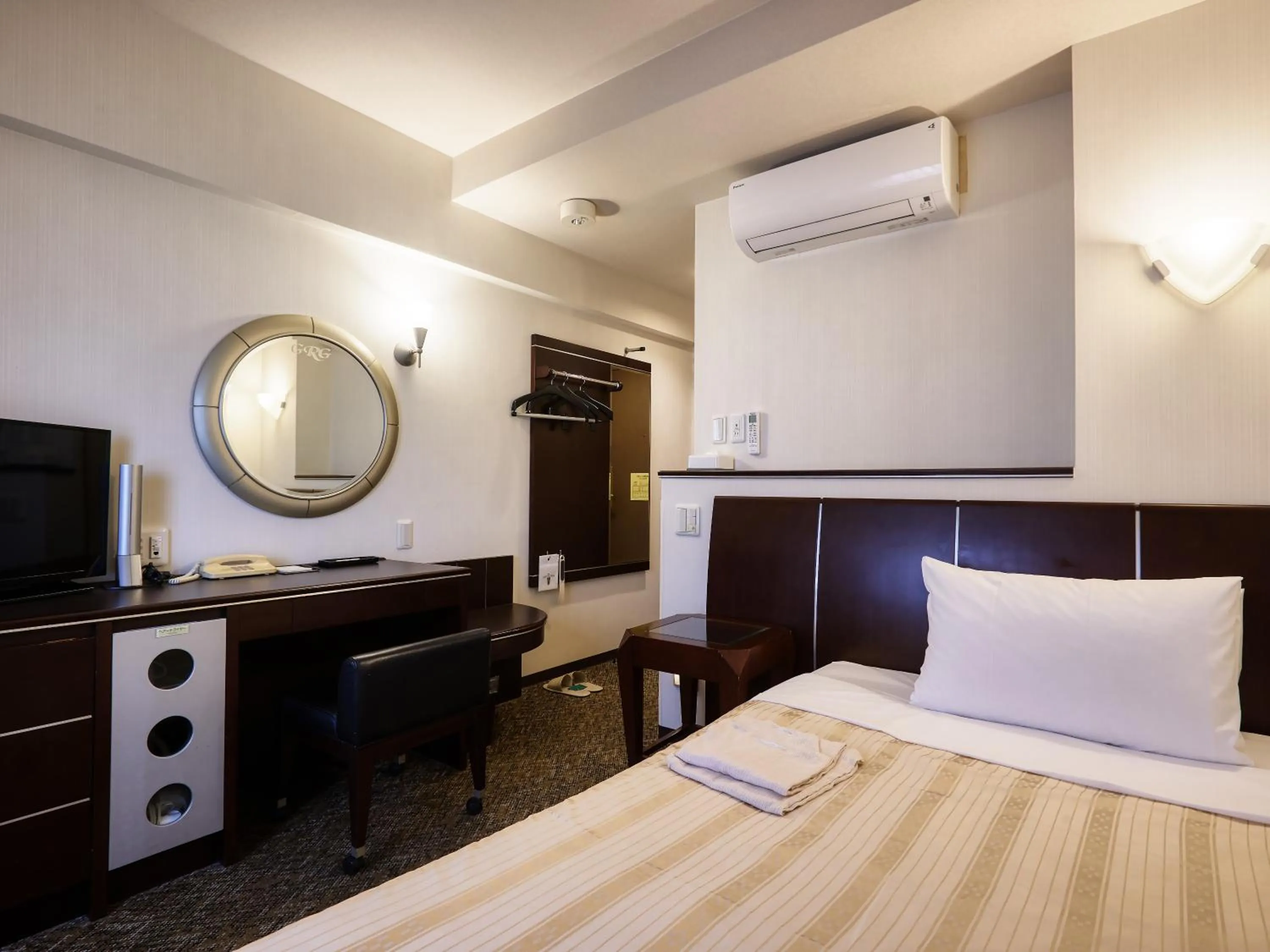 Photo of the whole room, Bed in GRG Hotel Naha