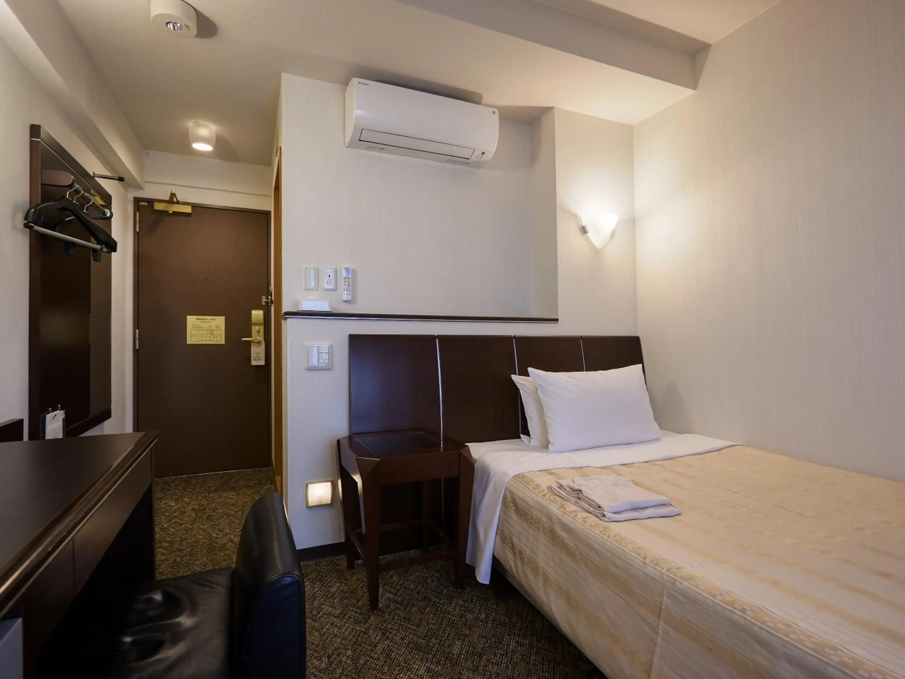 Photo of the whole room, Bed in GRG Hotel Naha