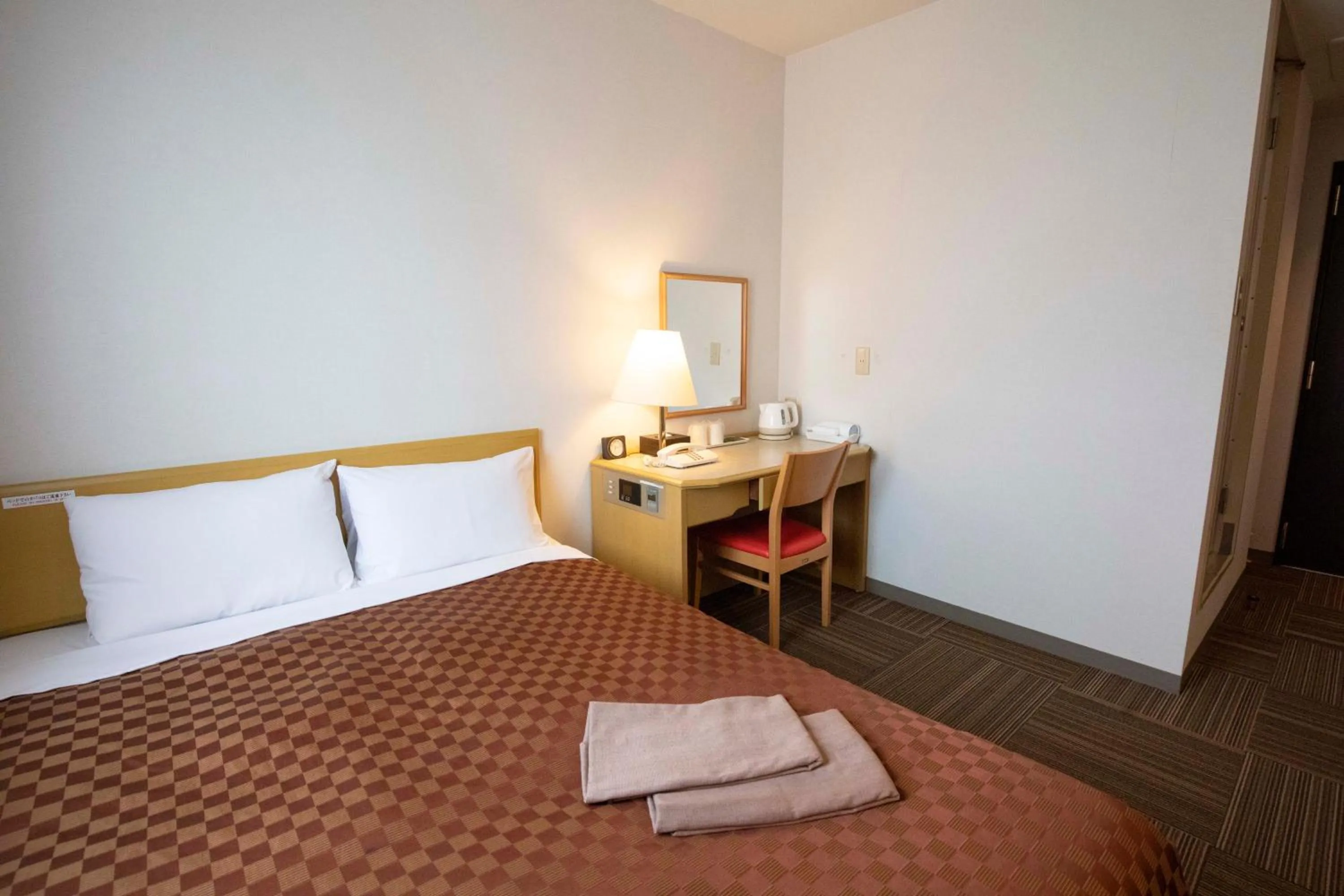 Photo of the whole room, Bed in Court Hotel Mito