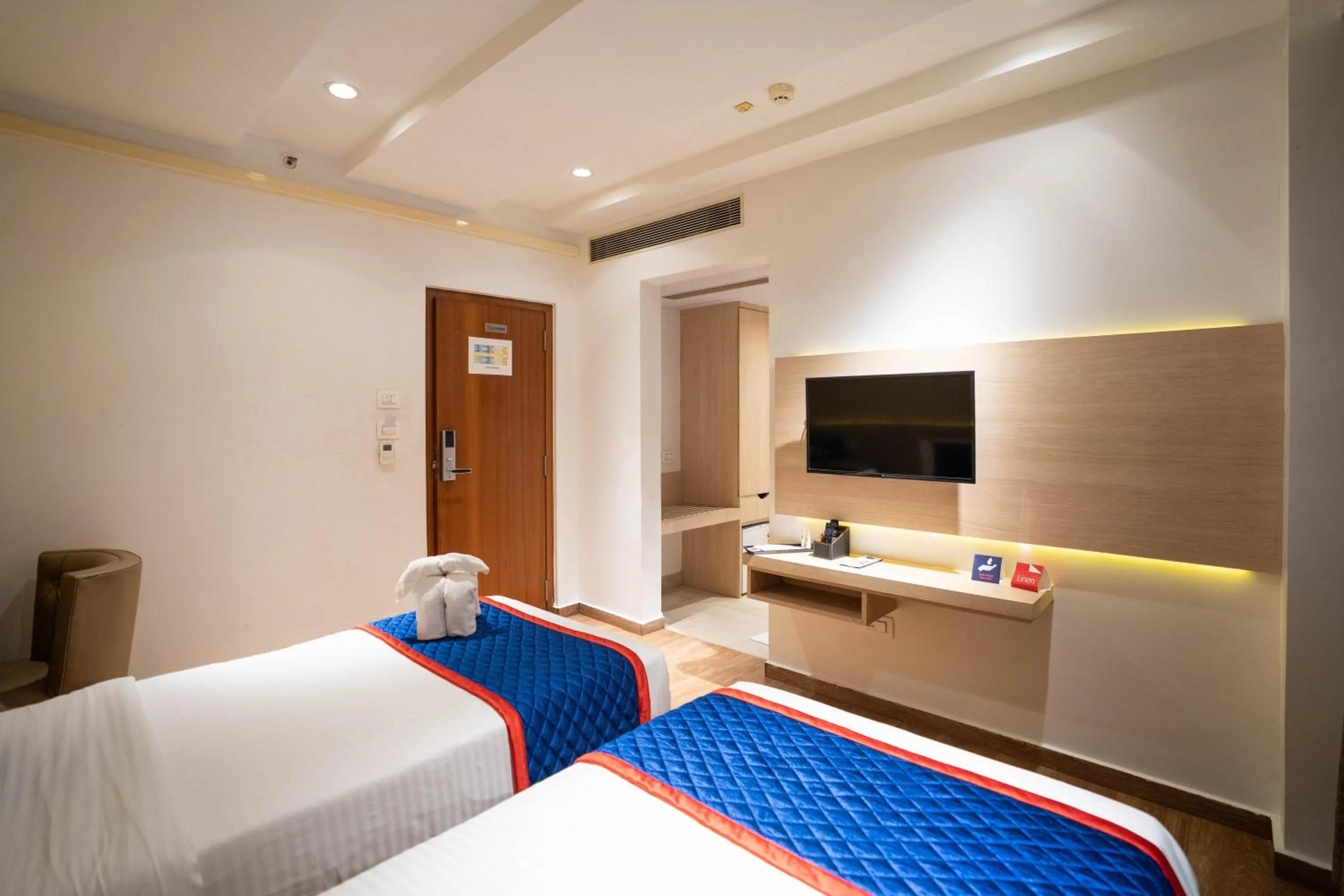 Bed in Zip By Spree Hotels Samudra Belgaum
