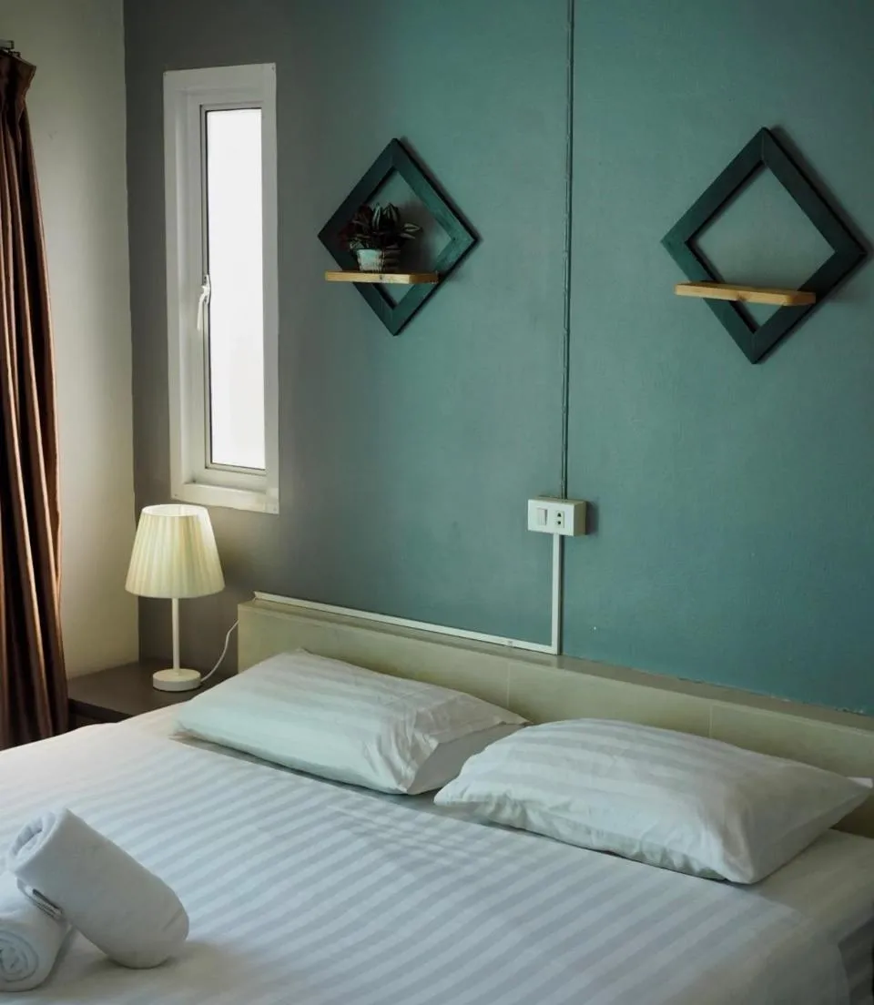 Bed in The Villa Residences Resort