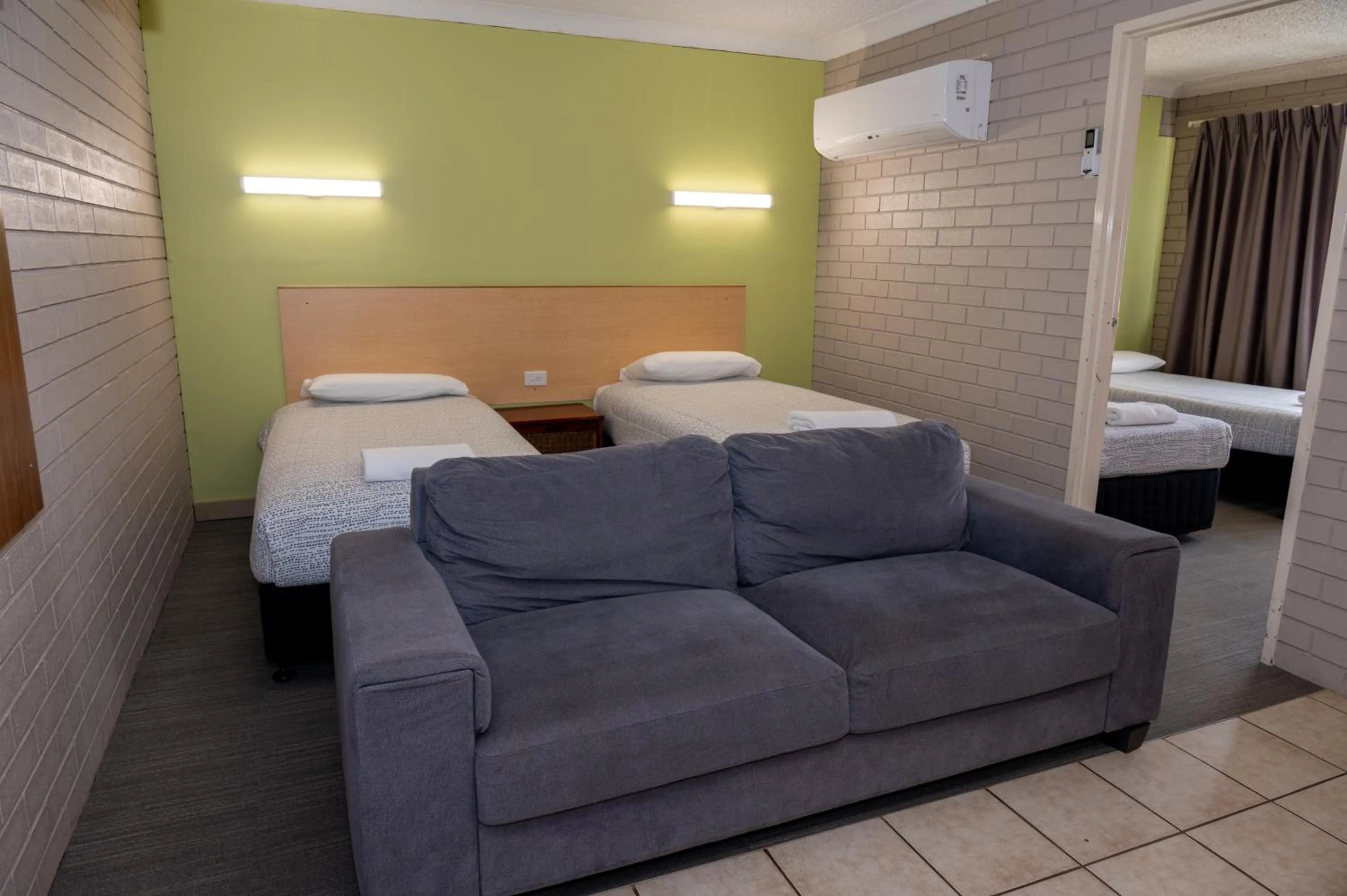 Bed in Tumut Valley Motel Pet Friendly