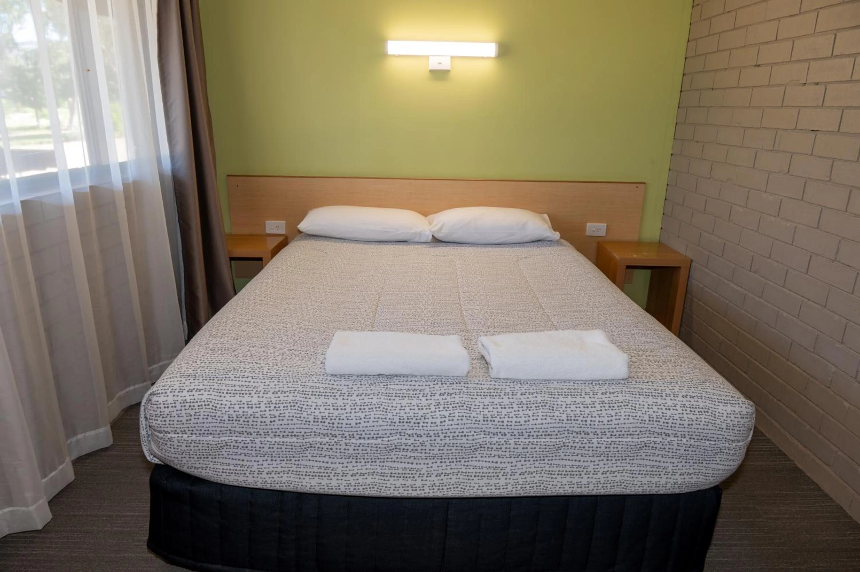 Bed in Tumut Valley Motel Pet Friendly