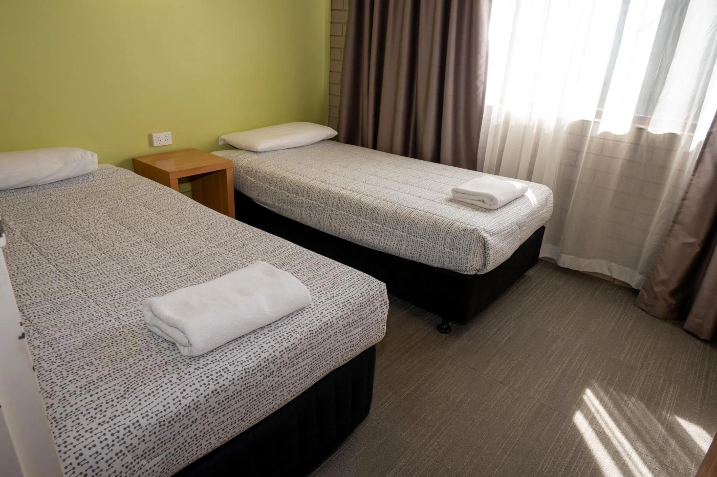 Bed in Tumut Valley Motel Pet Friendly