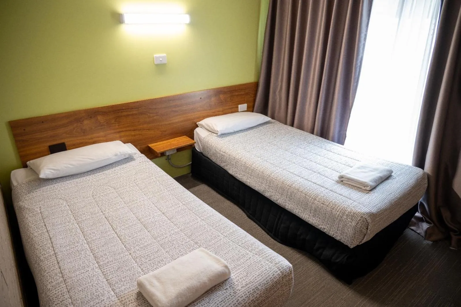 Bed in Tumut Valley Motel Pet Friendly