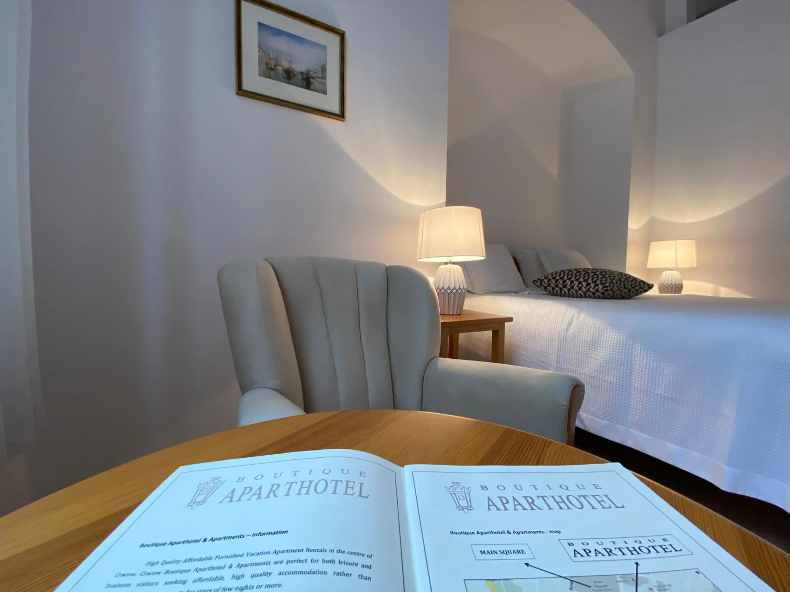 Property logo or sign, Bed in Boutique Aparthotel Property logo or sign, Bed in Boutique Aparthotel