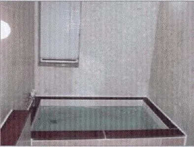 Hot Tub in Grass Hopper